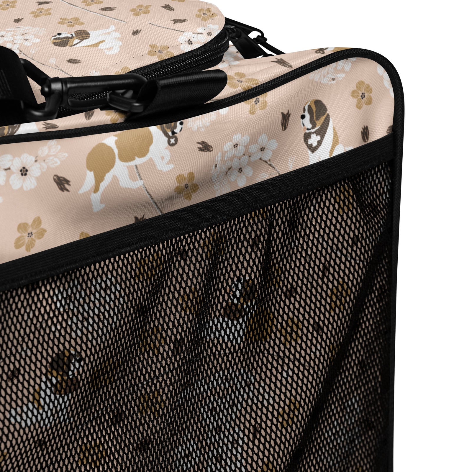 Floral Saint Bernard duffle bag with adjustable padded black shoulder strap, dual carry handles, zippered compartments, and mesh side pocket in white, brown, gold, and soft pink.