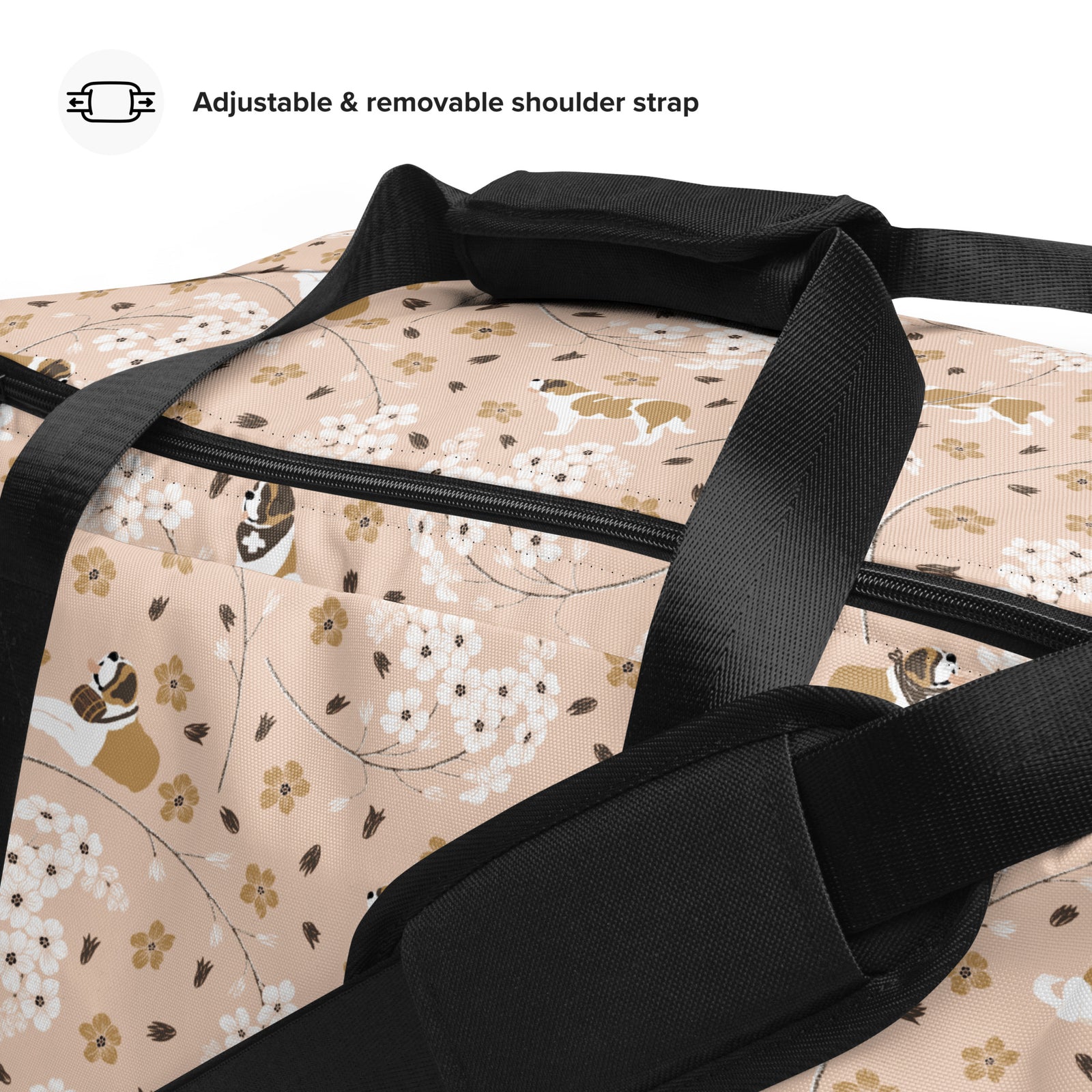 Floral Saint Bernard duffle bag with adjustable padded black shoulder strap, dual carry handles, zippered compartments, and mesh side pocket in white, brown, gold, and soft pink.