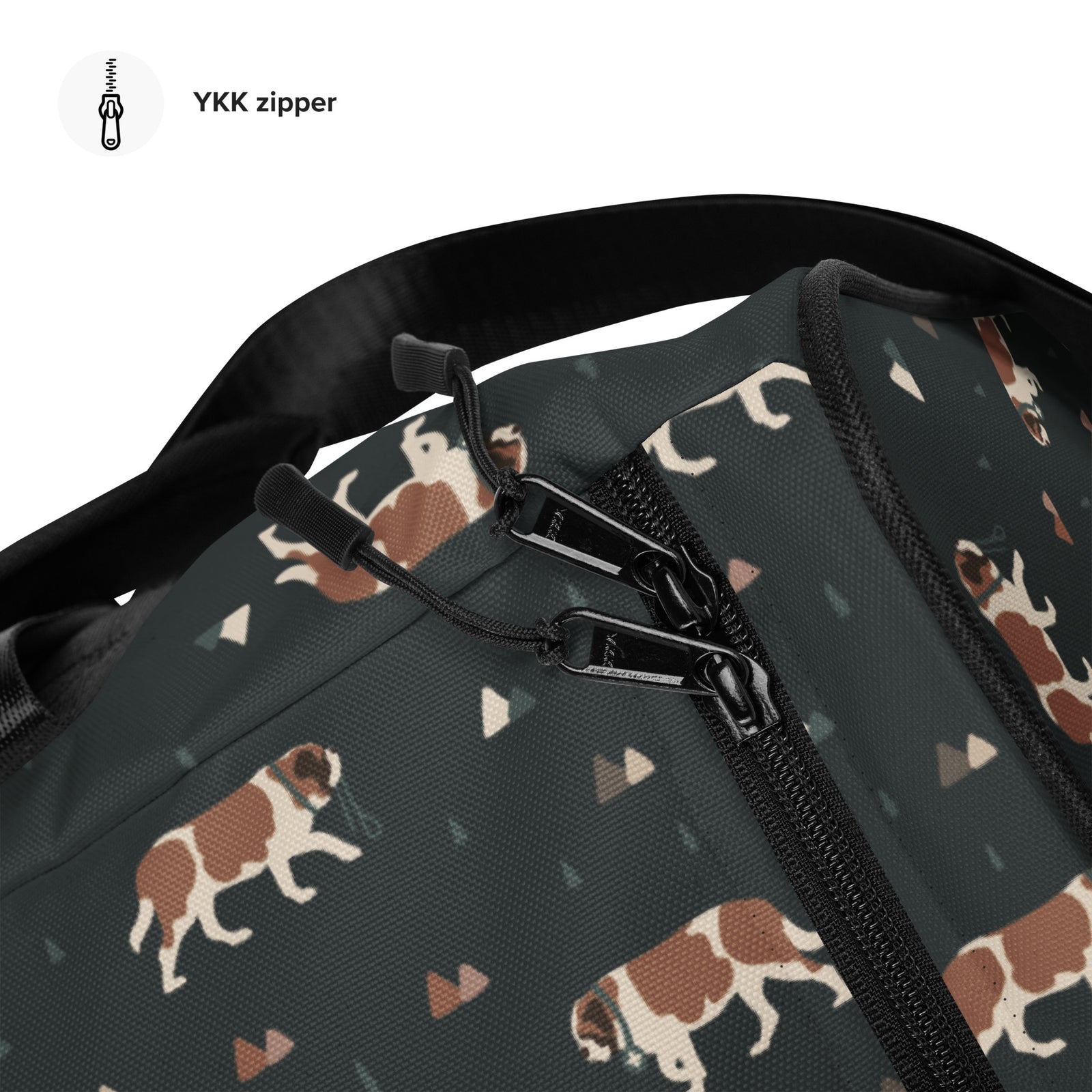 Green Mountain Saint Bernard duffle bag with adjustable padded black shoulder strap, handles, zip compartment, and mesh side pocket on dark green background with mountains, pines and dog pattern.