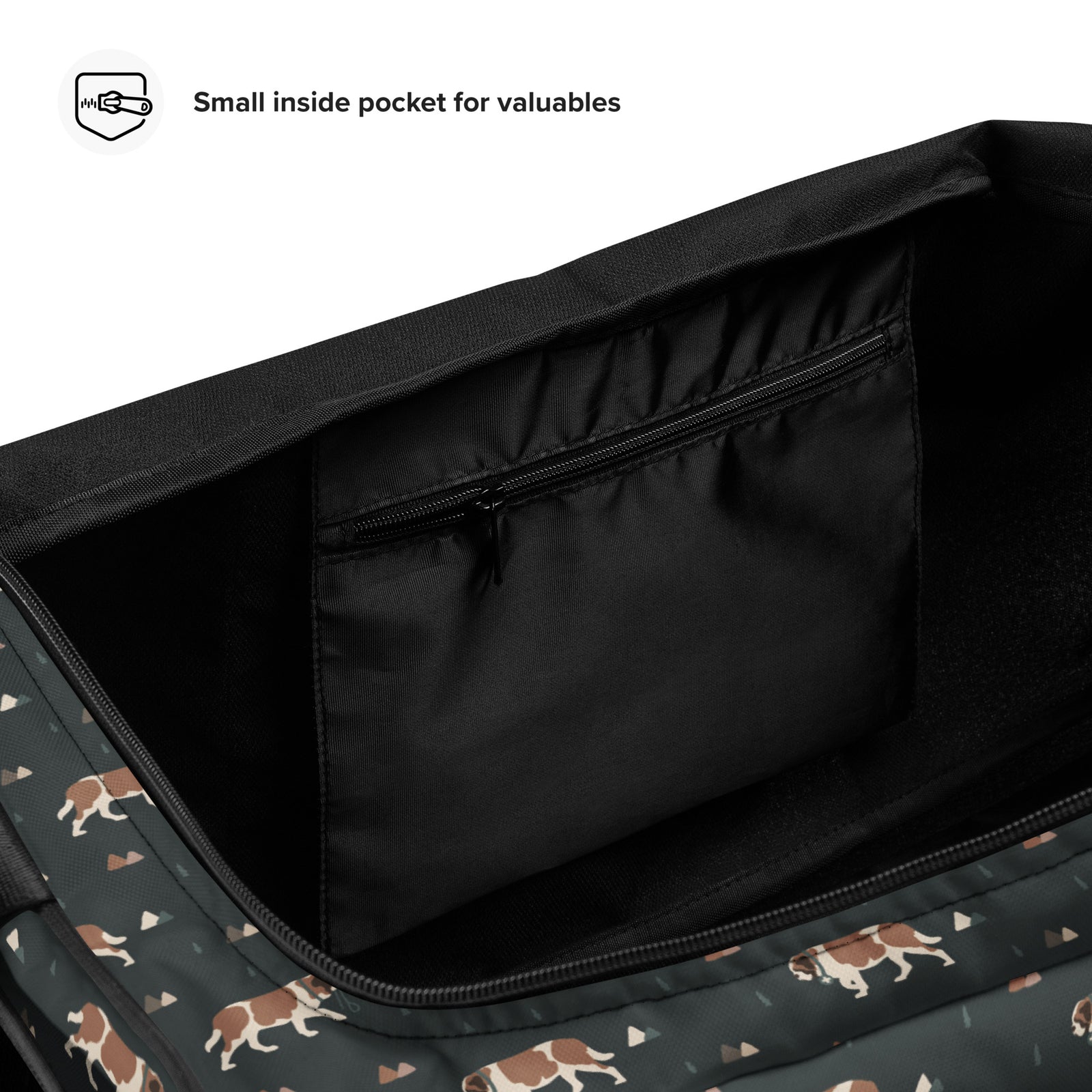Green Mountain Saint Bernard duffle bag with adjustable padded black shoulder strap, handles, zip compartment, and mesh side pocket on dark green background with mountains, pines and dog pattern.