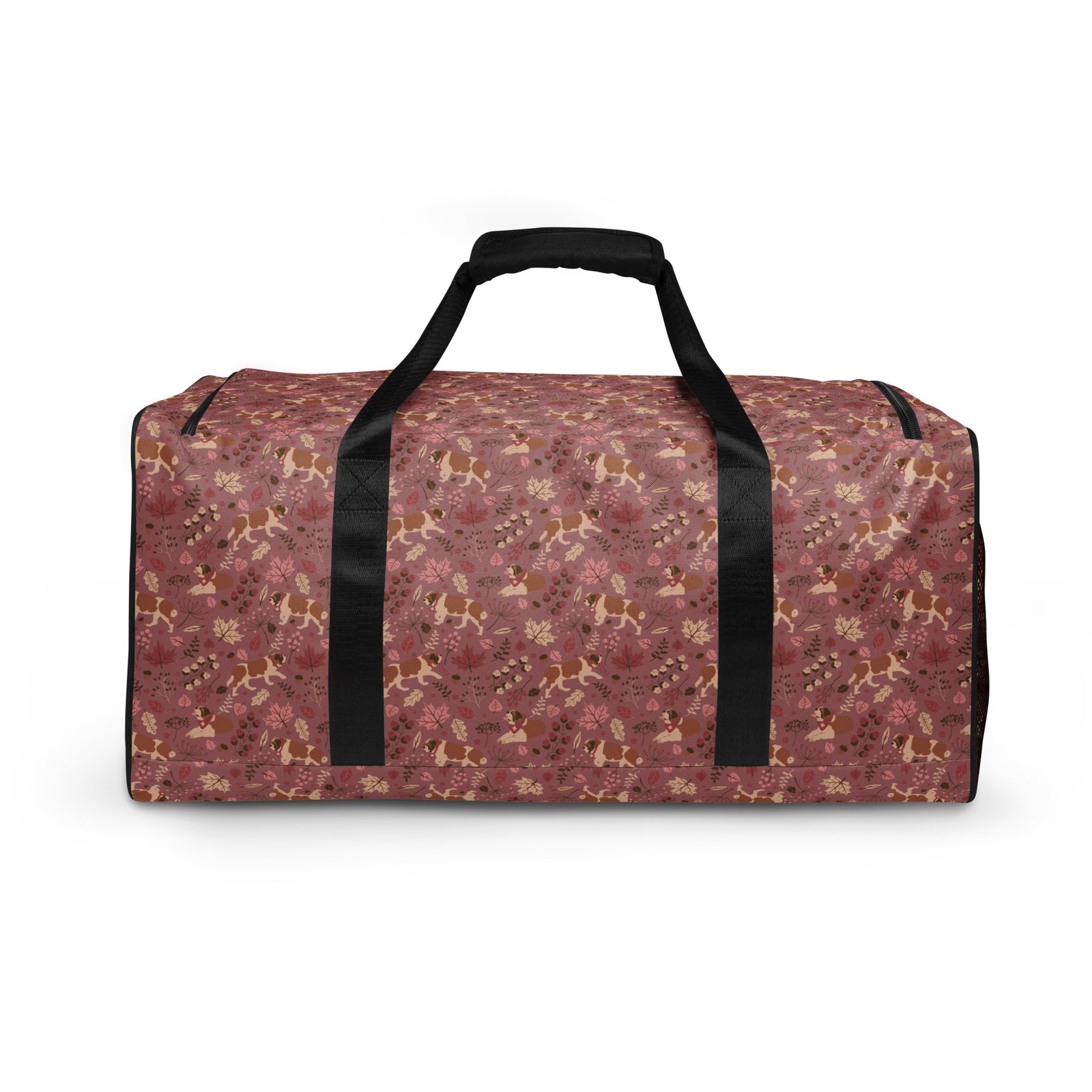 Rosy Fall Saint Bernard floral duffle bag in warm pink, brown, and autumn leaf tones with black padded shoulder strap, handles, zip compartment, and mesh side pocket.