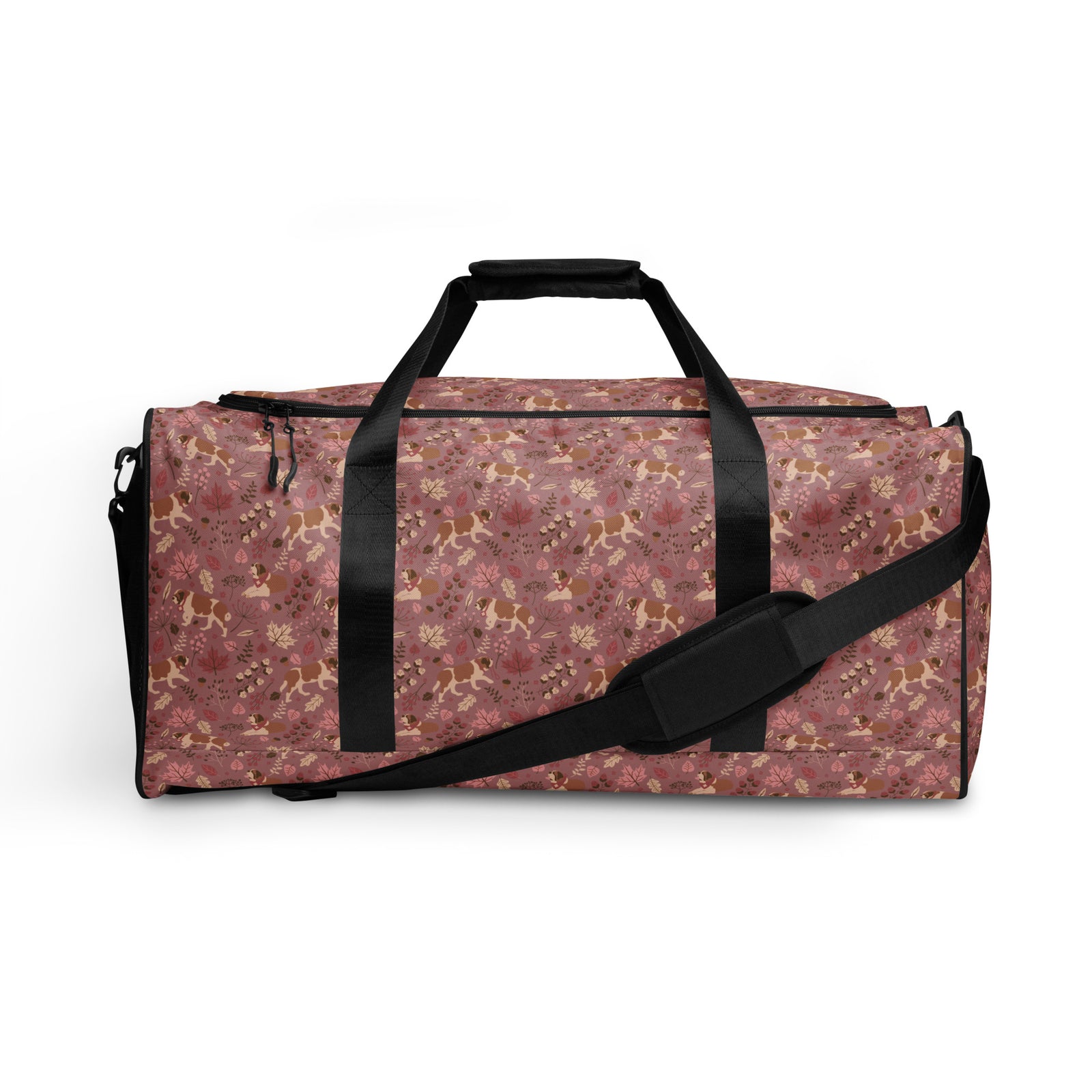 Rosy Fall Saint Bernard floral duffle bag in warm pink, brown, and autumn leaf tones with black padded shoulder strap, handles, zip compartment, and mesh side pocket.