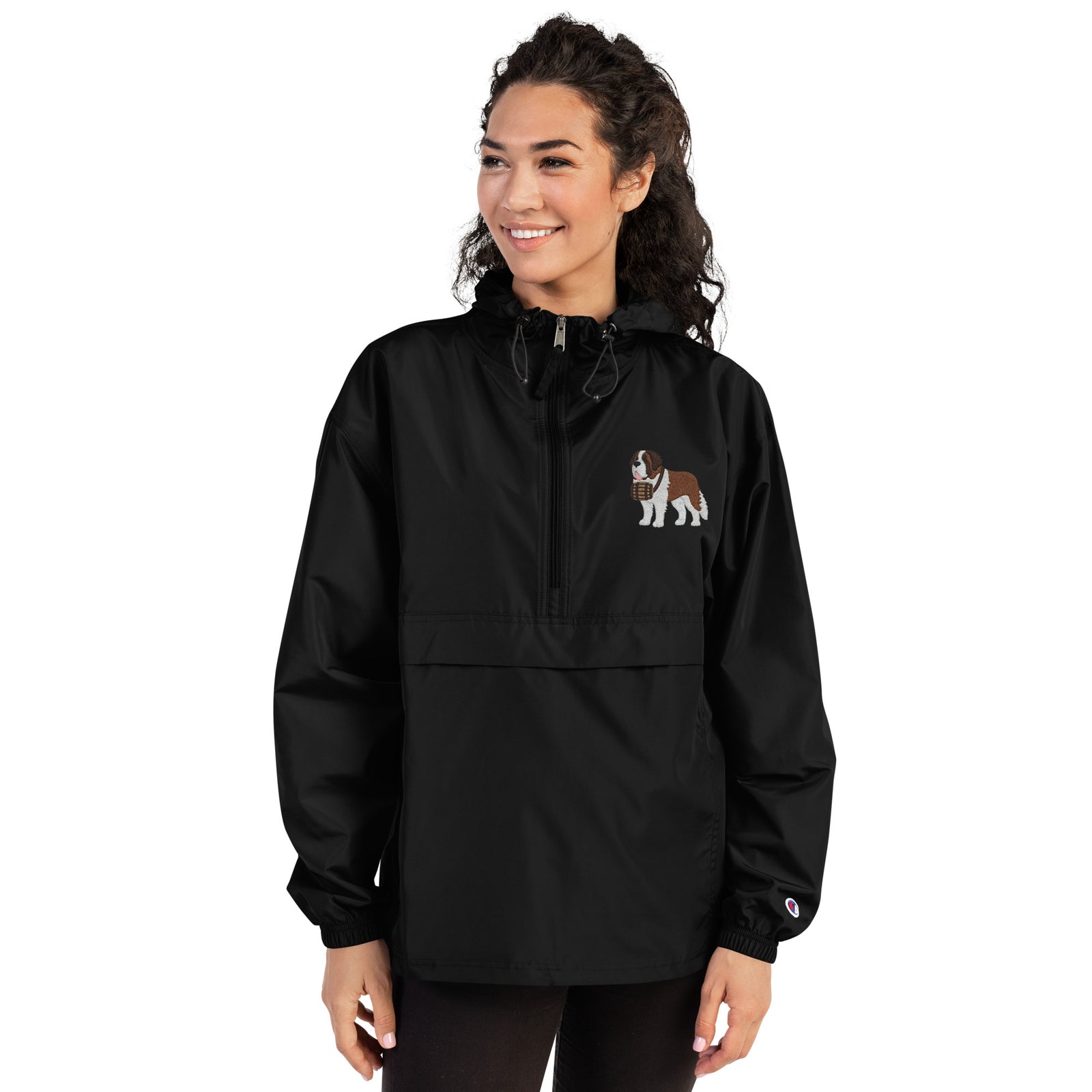 Black Champion packable windbreaker with chest embroidered Saint Bernard and barrel, half zip pullover with hood, kangaroo pocket, and zip pouch.