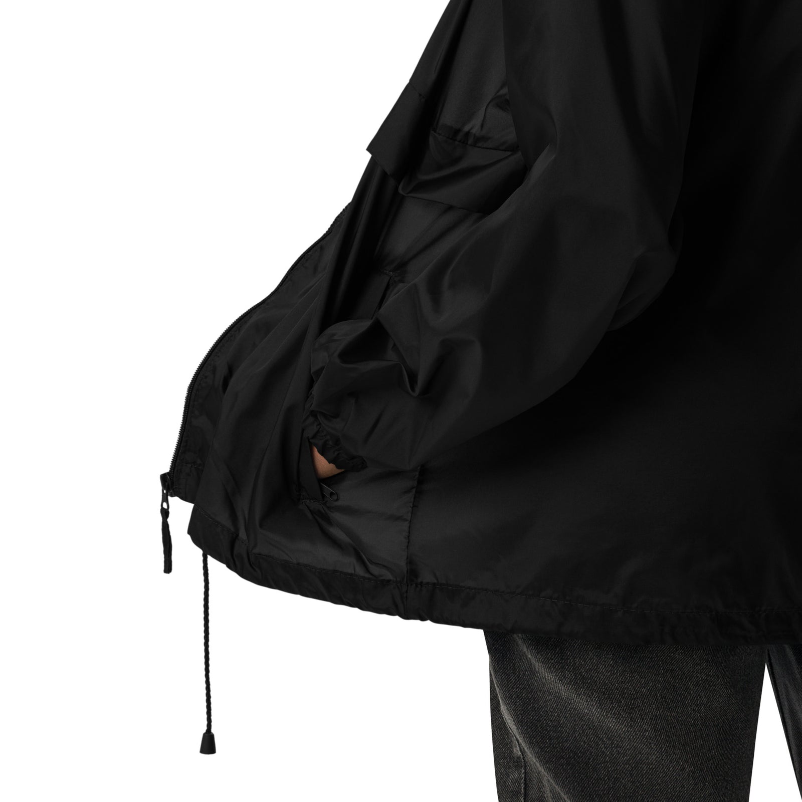 Lightweight, packable black windbreaker with chest embroidered Saint Bernard and barrel, adjustable hood, elastic cuffs, and zip pockets.