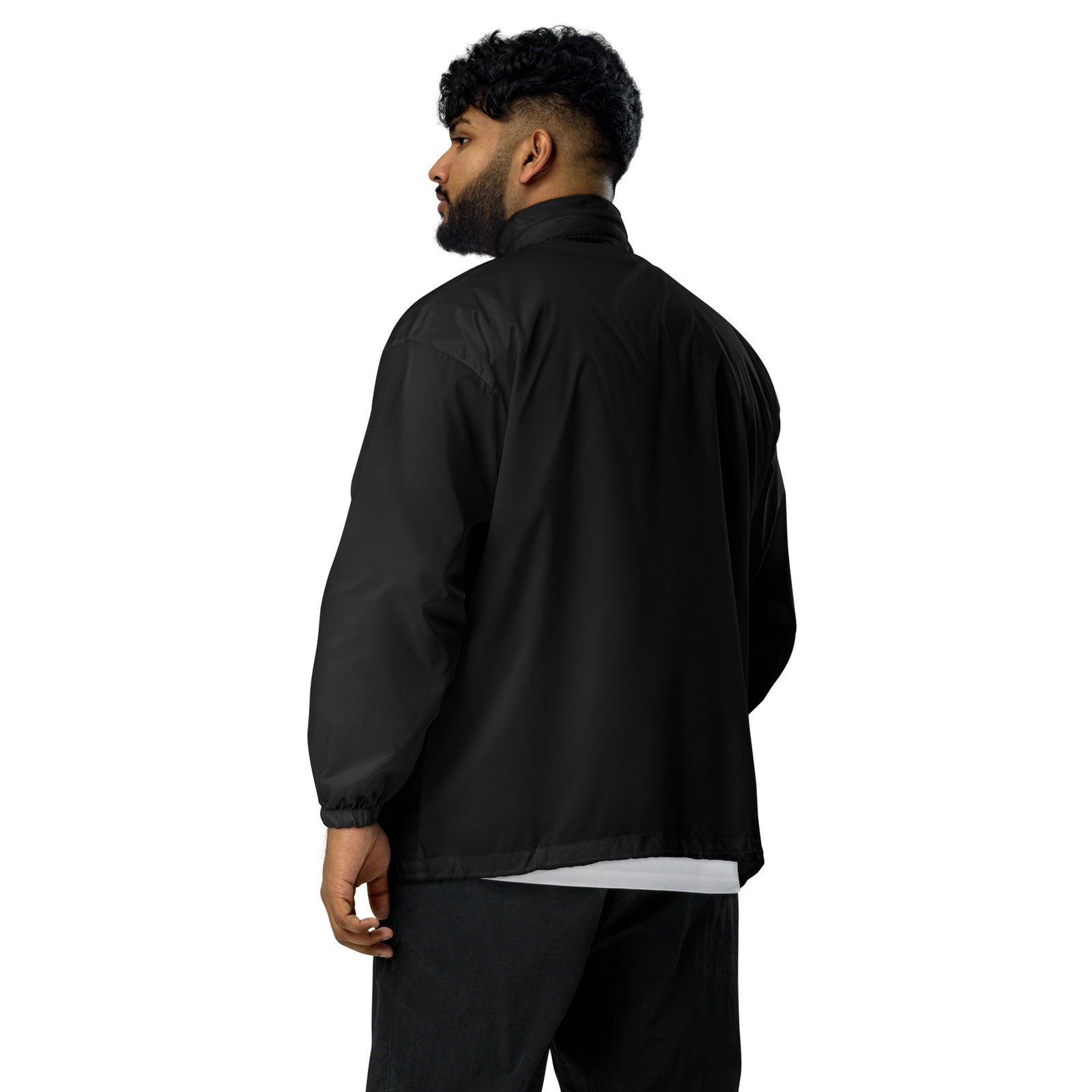 Lightweight, packable black windbreaker with chest embroidered Saint Bernard and barrel, adjustable hood, elastic cuffs, and zip pockets.