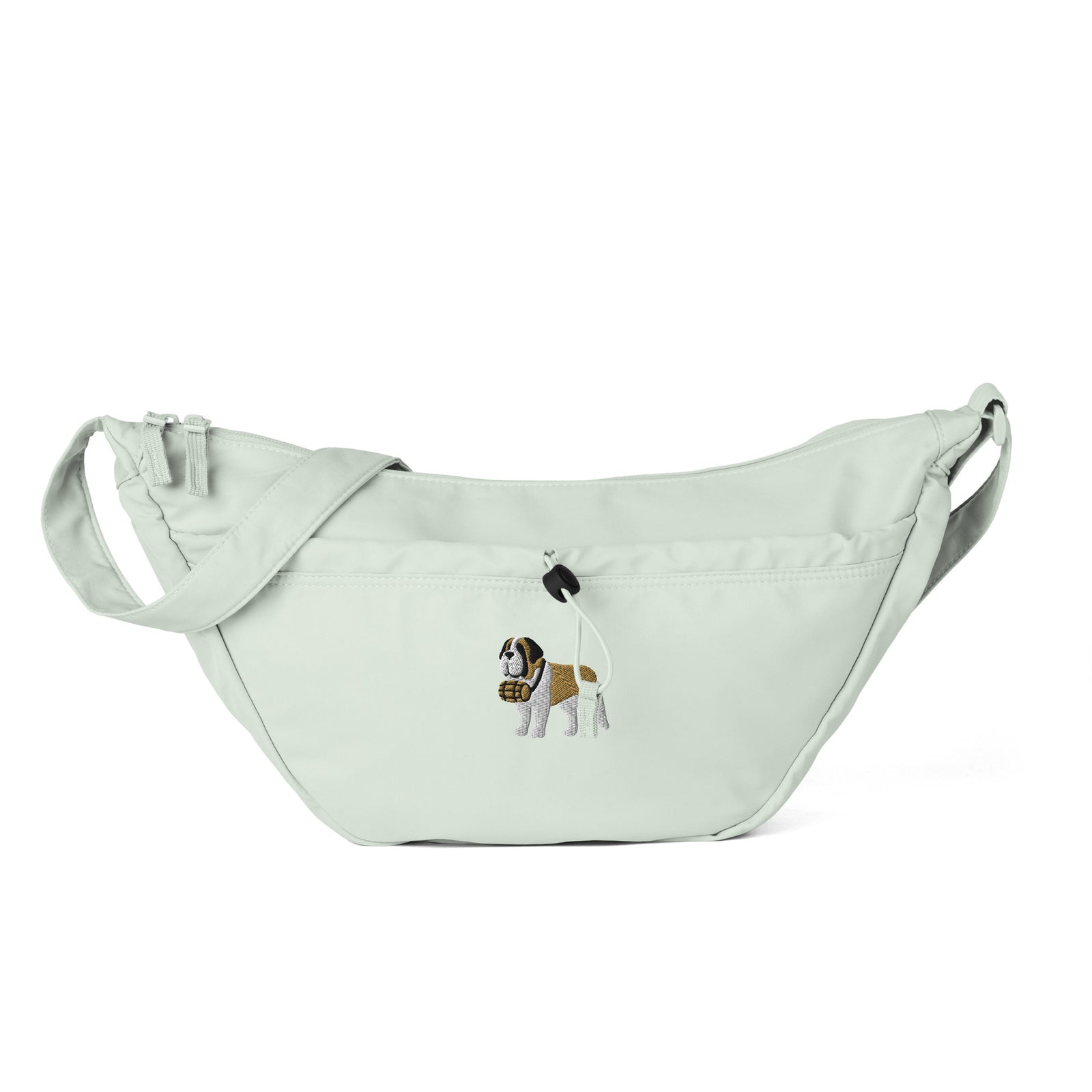 Fresh green Saint Bernard everyday crossbody bag with an embroidered Saint Bernard and rescue barrel, adjustable strap, and zip closure.