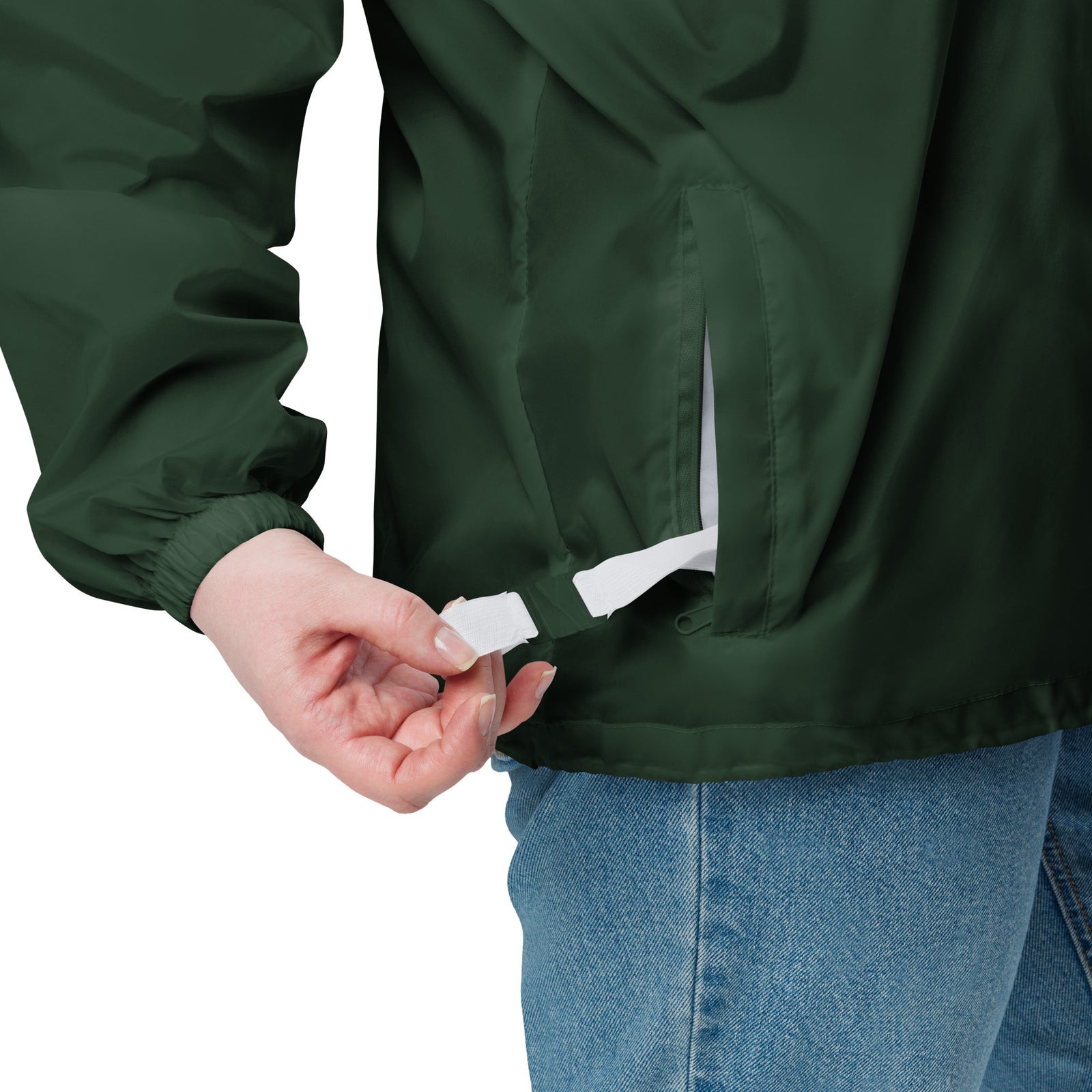 Lightweight, packable forest green windbreaker with chest embroidered Saint Bernard and barrel, adjustable hood, elastic cuffs, and zip pockets.