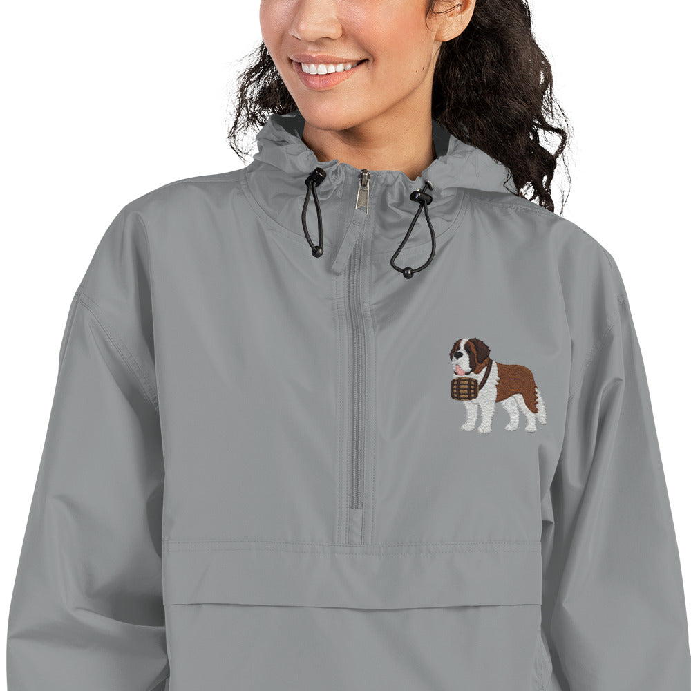 Light gray Champion packable windbreaker with chest embroidered Saint Bernard and barrel, half zip pullover with hood, kangaroo pocket, and zip pouch.
