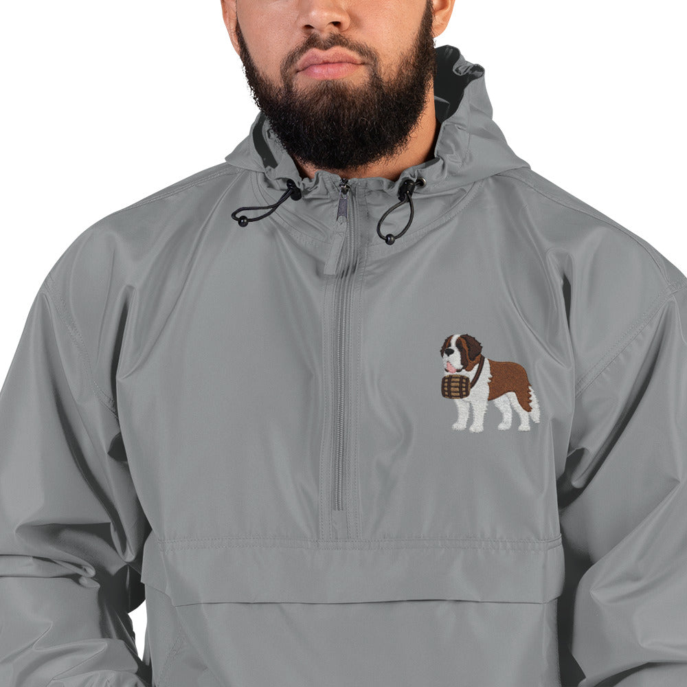 Light gray Champion packable windbreaker with chest embroidered Saint Bernard and barrel, half zip pullover with hood, kangaroo pocket, and zip pouch.
