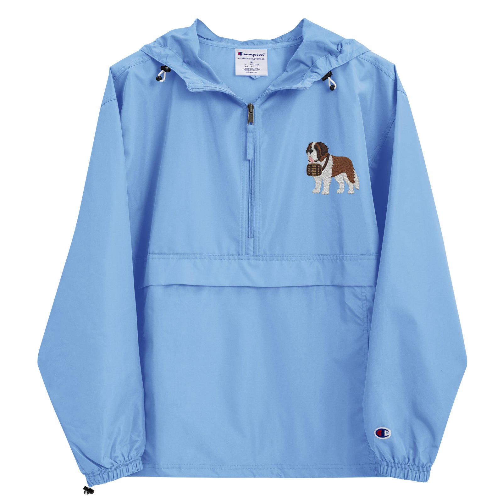 Light blue Champion packable windbreaker with chest embroidered Saint Bernard and barrel, half zip pullover with hood, kangaroo pocket, and zip pouch.