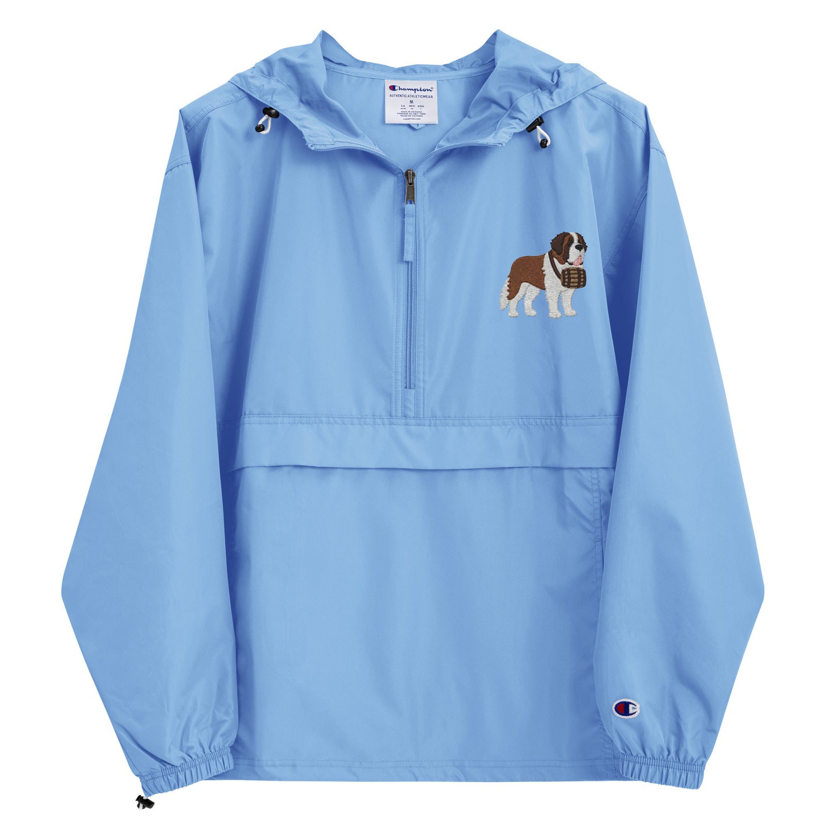 Light blue Champion packable windbreaker with chest embroidered Saint Bernard and barrel, half zip pullover with hood, kangaroo pocket, and zip pouch.
