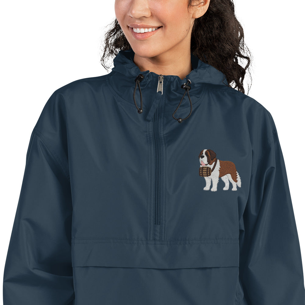 Navy blue Champion packable windbreaker with chest embroidered Saint Bernard and barrel, half zip pullover with hood, kangaroo pocket, and zip pouch.