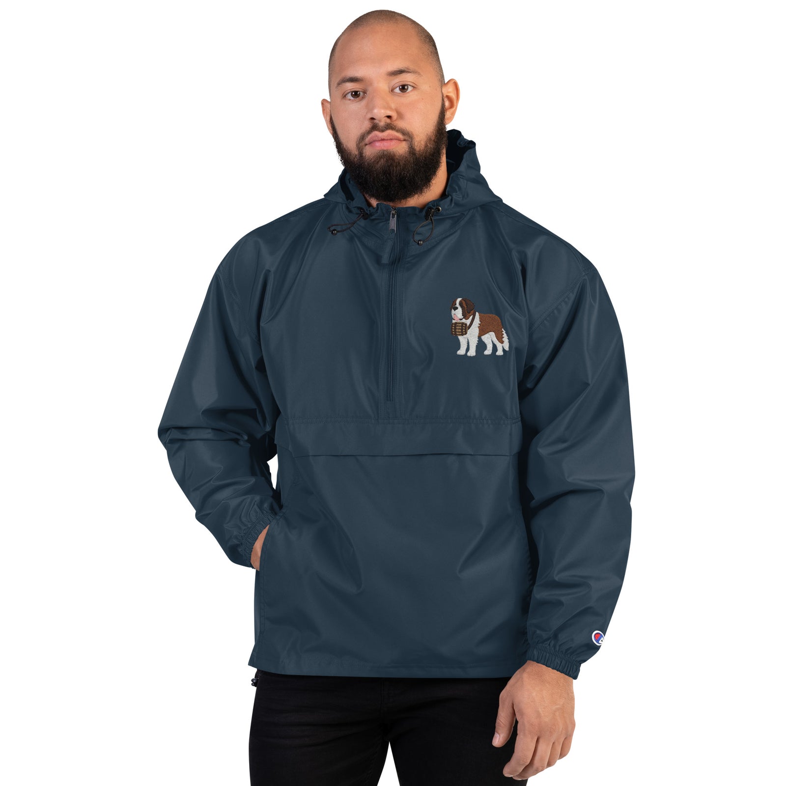 Navy blue Champion packable windbreaker with chest embroidered Saint Bernard and barrel, half zip pullover with hood, kangaroo pocket, and zip pouch.