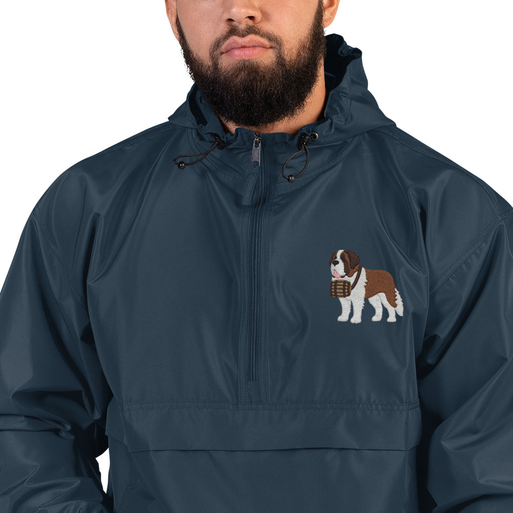 Navy blue Champion packable windbreaker with chest embroidered Saint Bernard and barrel, half zip pullover with hood, kangaroo pocket, and zip pouch.