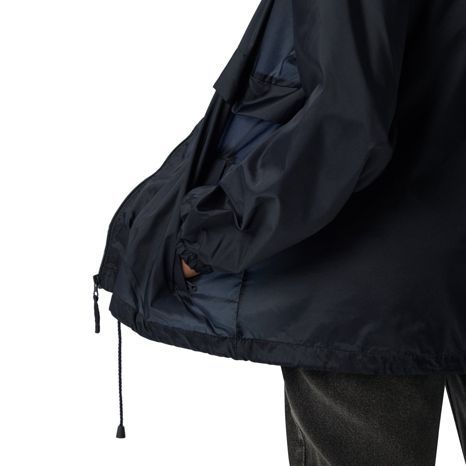 Lightweight, packable navy blue windbreaker with chest embroidered Saint Bernard and barrel, adjustable hood, elastic cuffs, and zip pockets.