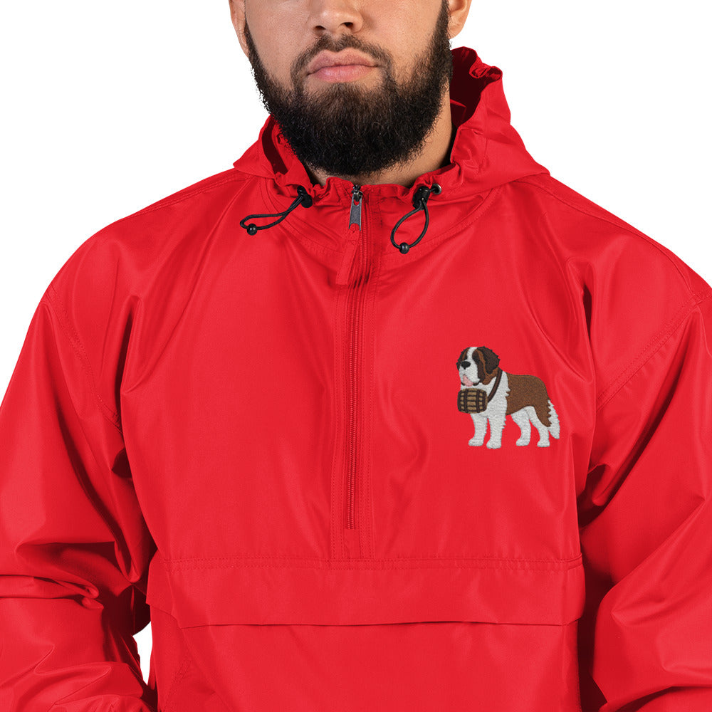 Red Champion packable windbreaker with chest embroidered Saint Bernard and barrel, half zip pullover with hood, kangaroo pocket, and zip pouch.