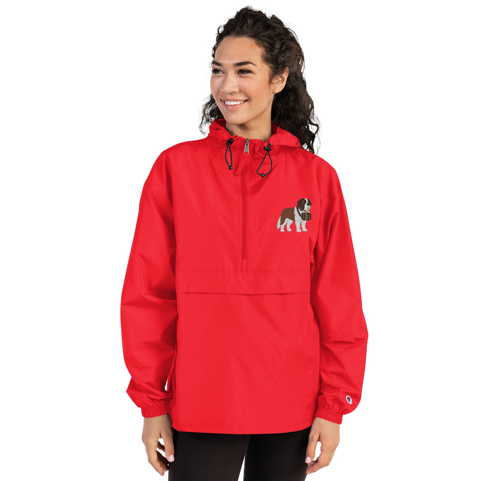 Red Champion packable windbreaker with chest embroidered Saint Bernard and barrel, half zip pullover with hood, kangaroo pocket, and zip pouch.