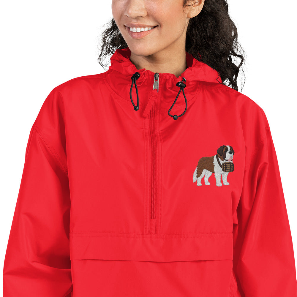 Red Champion packable windbreaker with chest embroidered Saint Bernard and barrel, half zip pullover with hood, kangaroo pocket, and zip pouch.