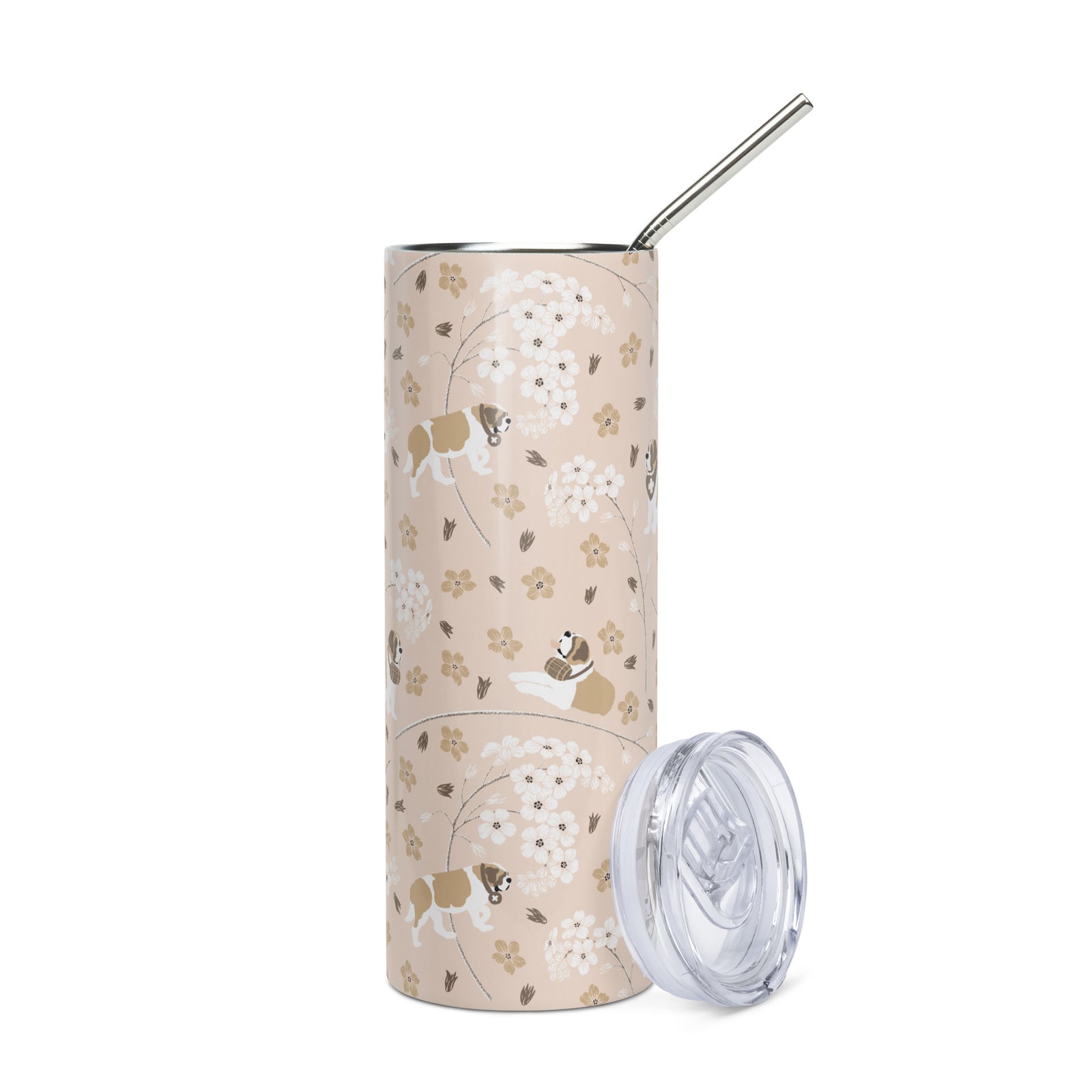 Stainless steel Forget Me Not Saint Bernard skinny tumbler with a blush finish featuring Saint Bernards among delicate white and golden florals, with a lid and metal straw.