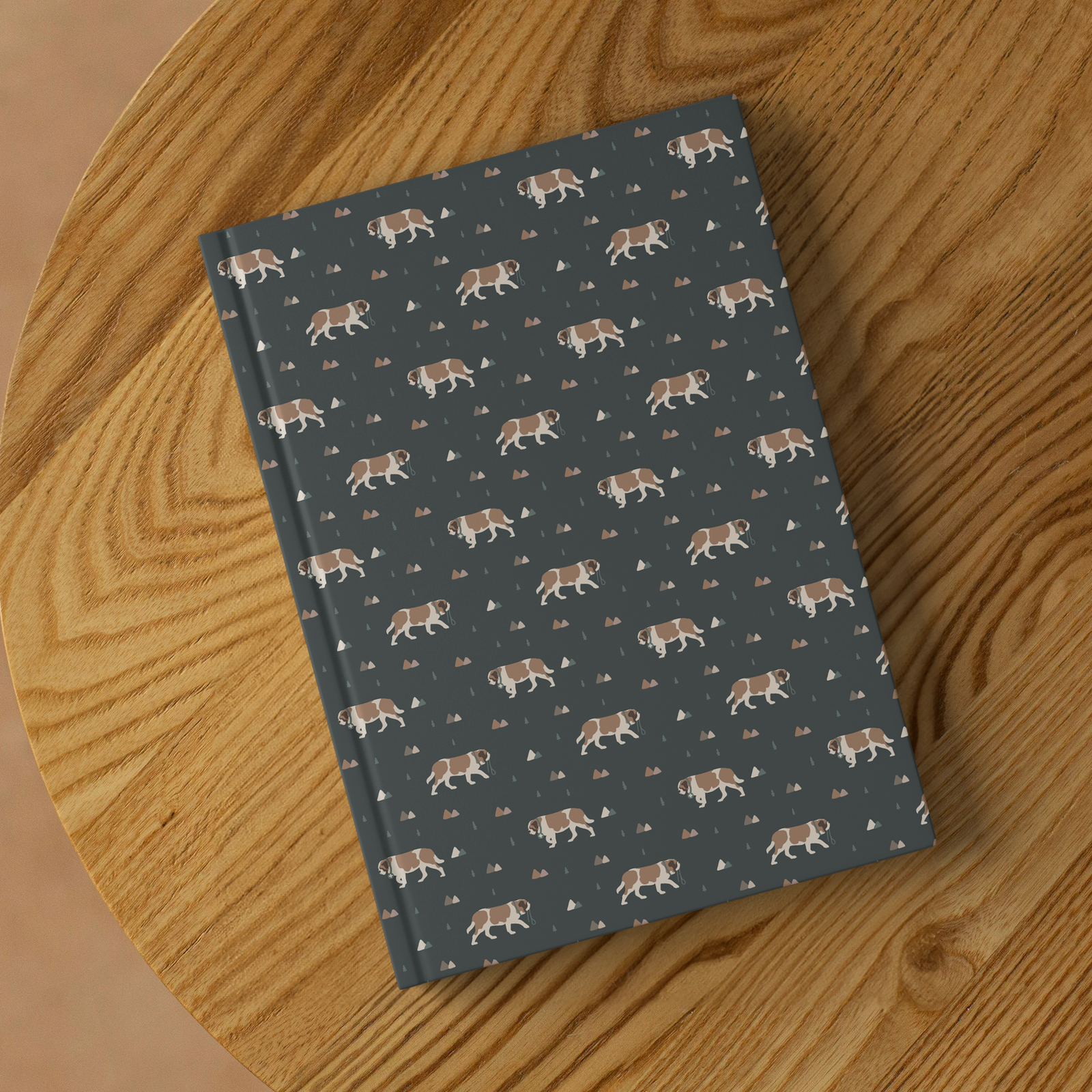 Green Mountain Saint Bernard hardcover lined journal with a forest-green cover featuring Saint Bernards walking among mountains and pine trees.