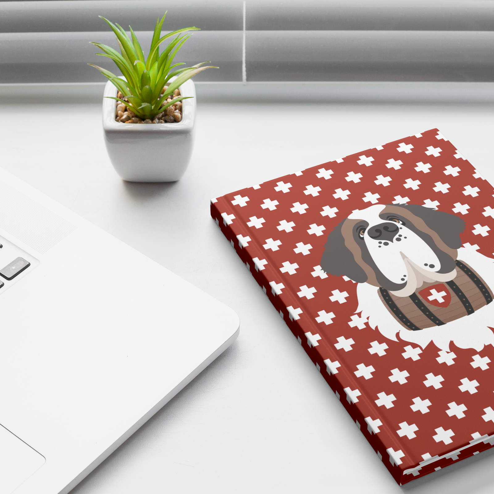 Swiss Cross Red Saint Bernard hardcover lined journal with a rich red cover featuring a Saint Bernard and rescue barrel among white Swiss crosses.
