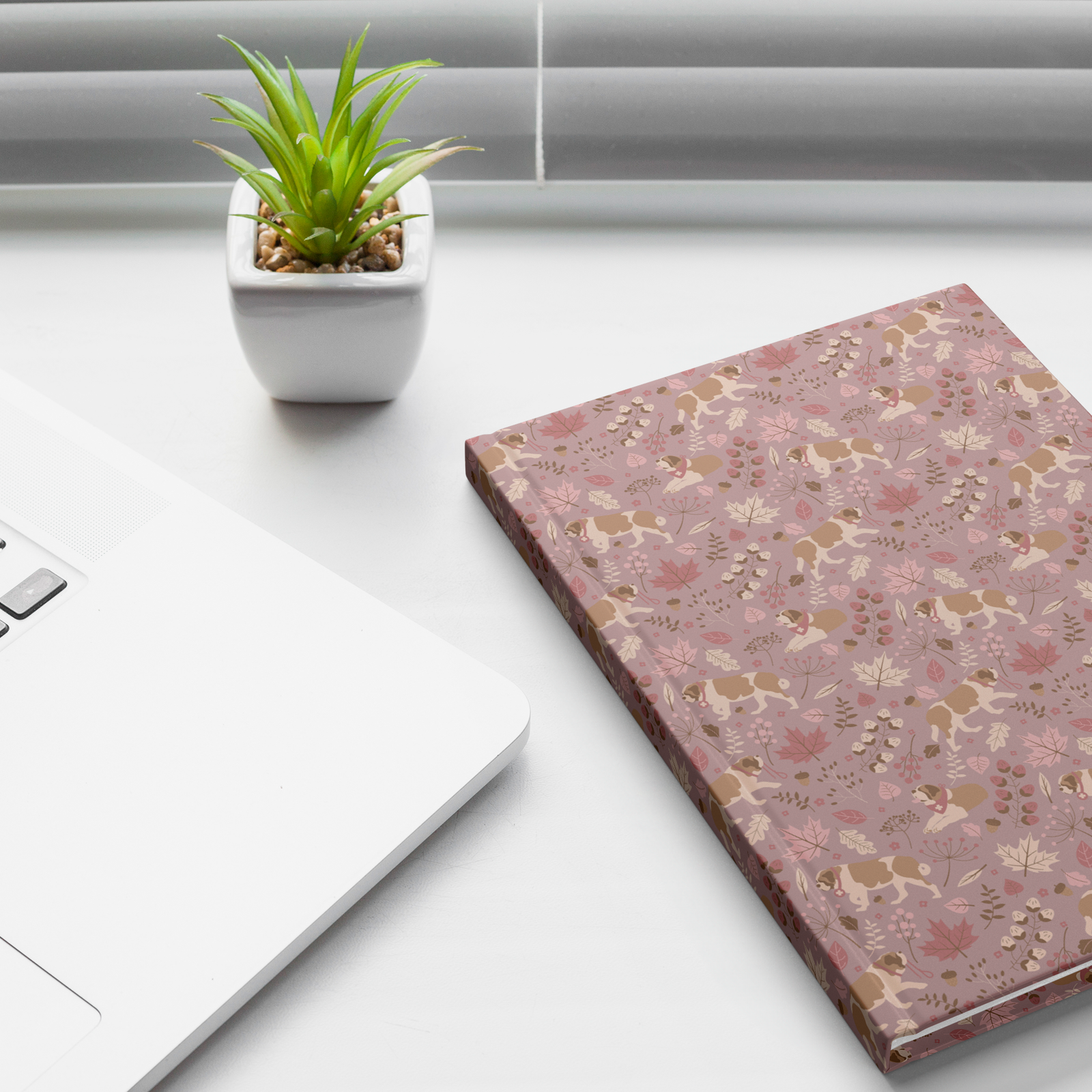 Rosy Fall Saint Bernard hardcover lined journal with a dusty-rose cover featuring Saint Bernards among maple leaves, acorns, and autumn berries.