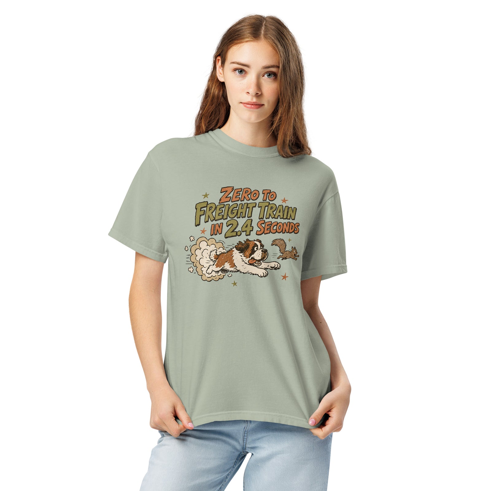 Bay green Comfort Colors t-shirt with a retro earth tone cartoon of a funny Saint Bernard chasing a squirrel and Zero to Freight Train in 2.4 Seconds lettering.