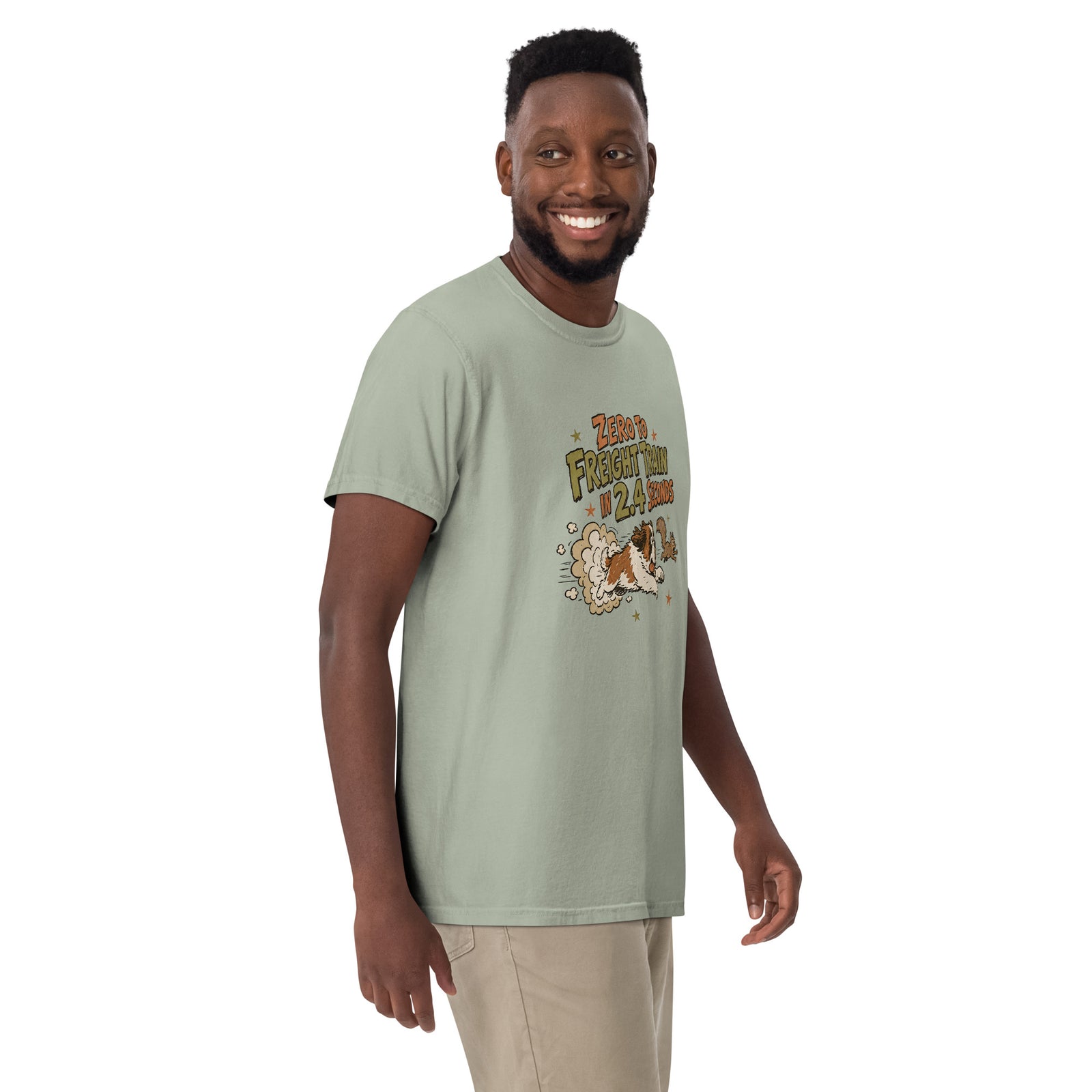 Bay green Comfort Colors t-shirt with a retro earth tone cartoon of a funny Saint Bernard chasing a squirrel and Zero to Freight Train in 2.4 Seconds lettering.