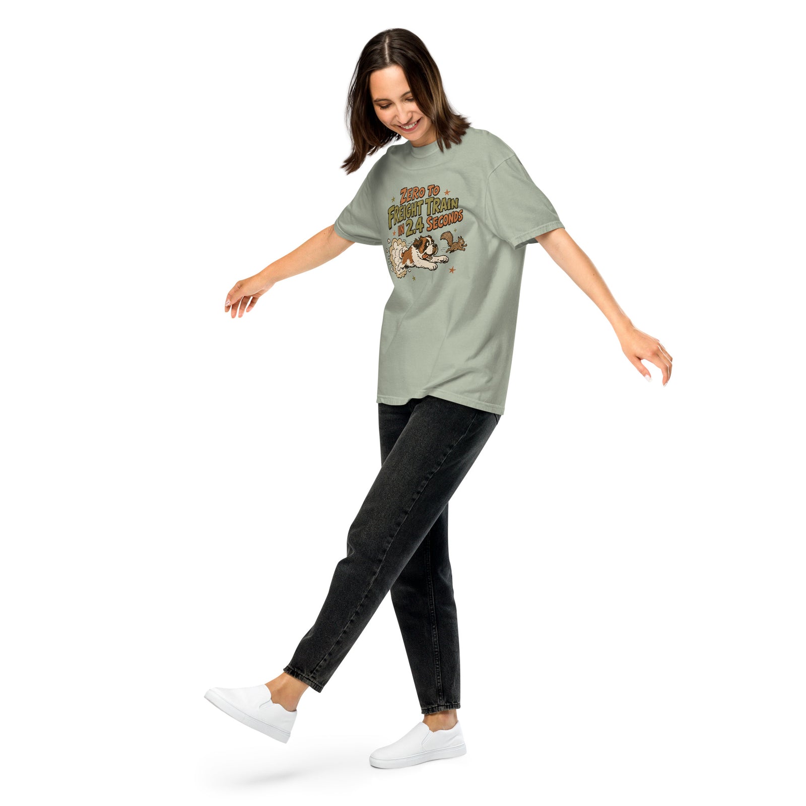 Bay green Comfort Colors t-shirt with a retro earth tone cartoon of a funny Saint Bernard chasing a squirrel and Zero to Freight Train in 2.4 Seconds lettering.