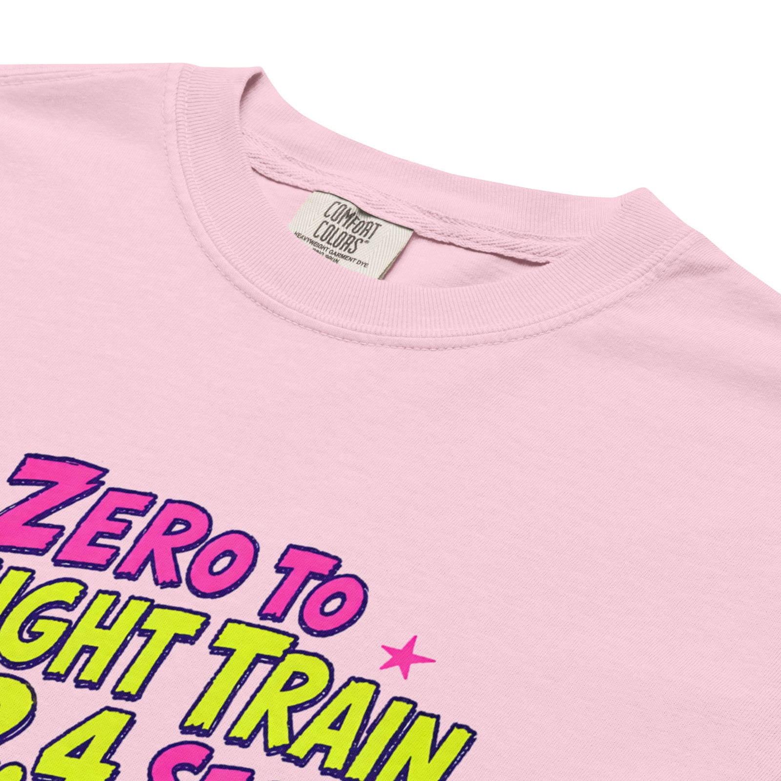 Blossom pink Comfort Colors t-shirt with a bright retro cartoon Saint Bernard chasing a squirrel and Zero to Freight Train in 2.4 Seconds lettering.