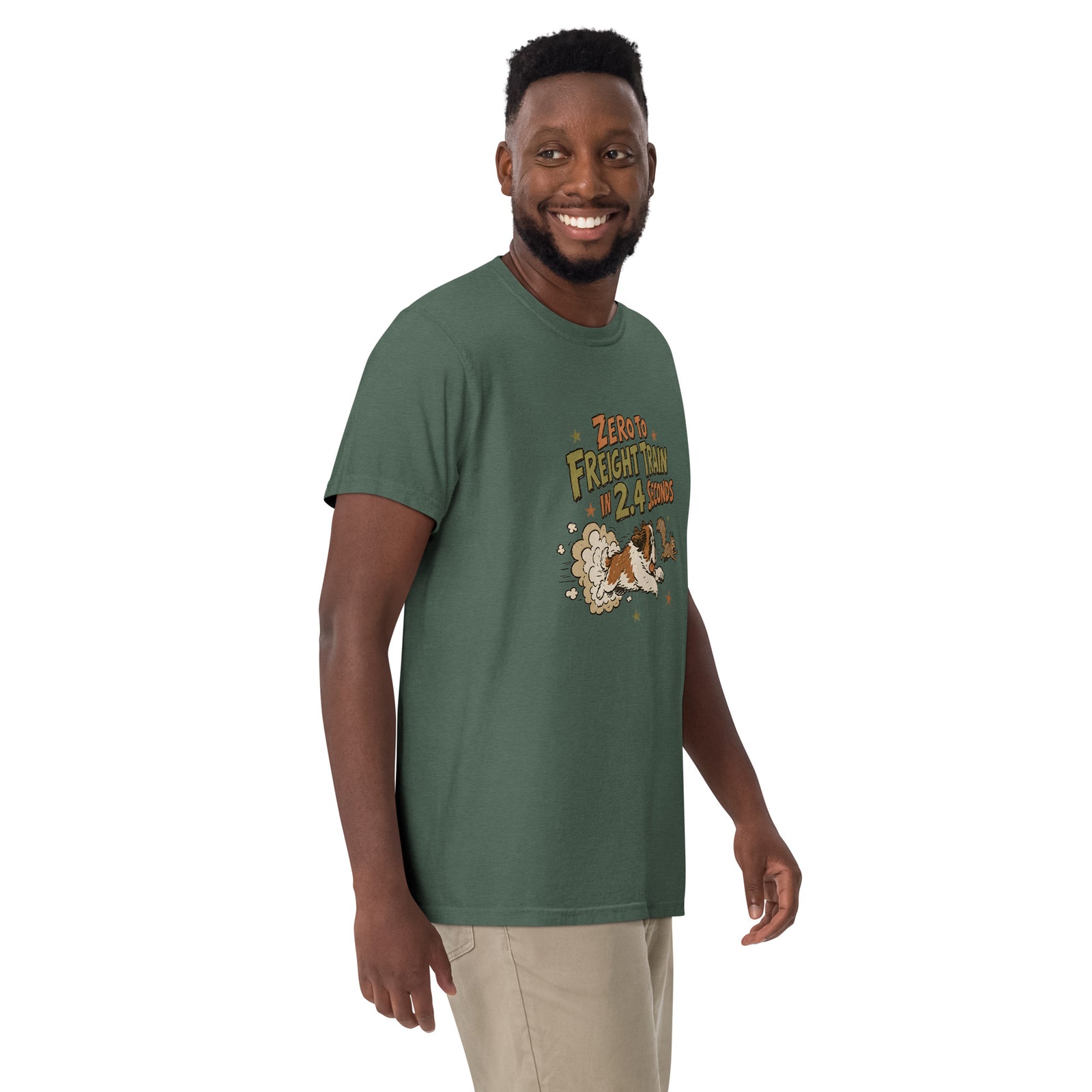 Blue spruce Comfort Colors t-shirt with a retro earth tone cartoon of a funny Saint Bernard chasing a squirrel and Zero to Freight Train in 2.4 Seconds lettering.