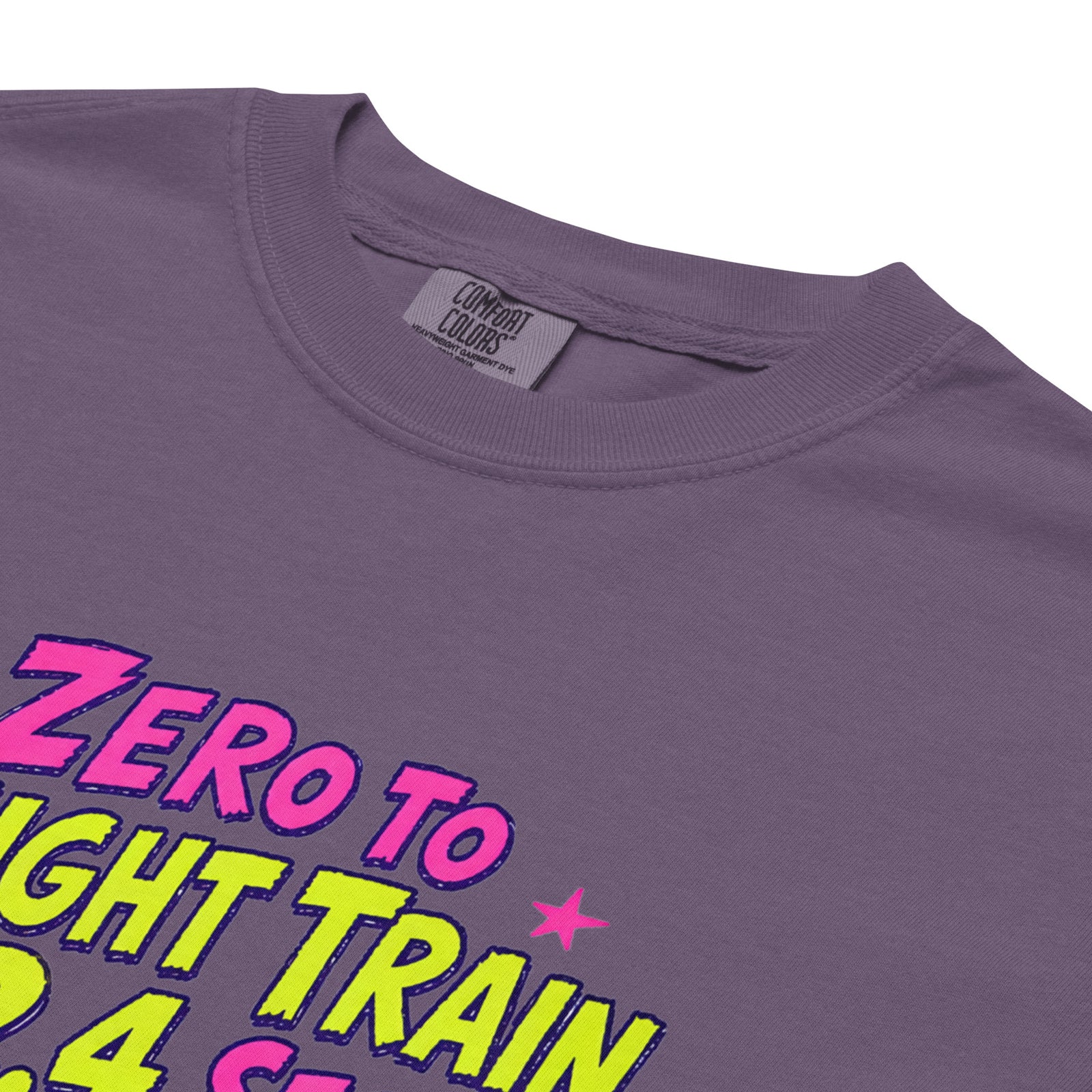 Grape purple Comfort Colors t-shirt with a bright retro cartoon Saint Bernard chasing a squirrel and Zero to Freight Train in 2.4 Seconds lettering.