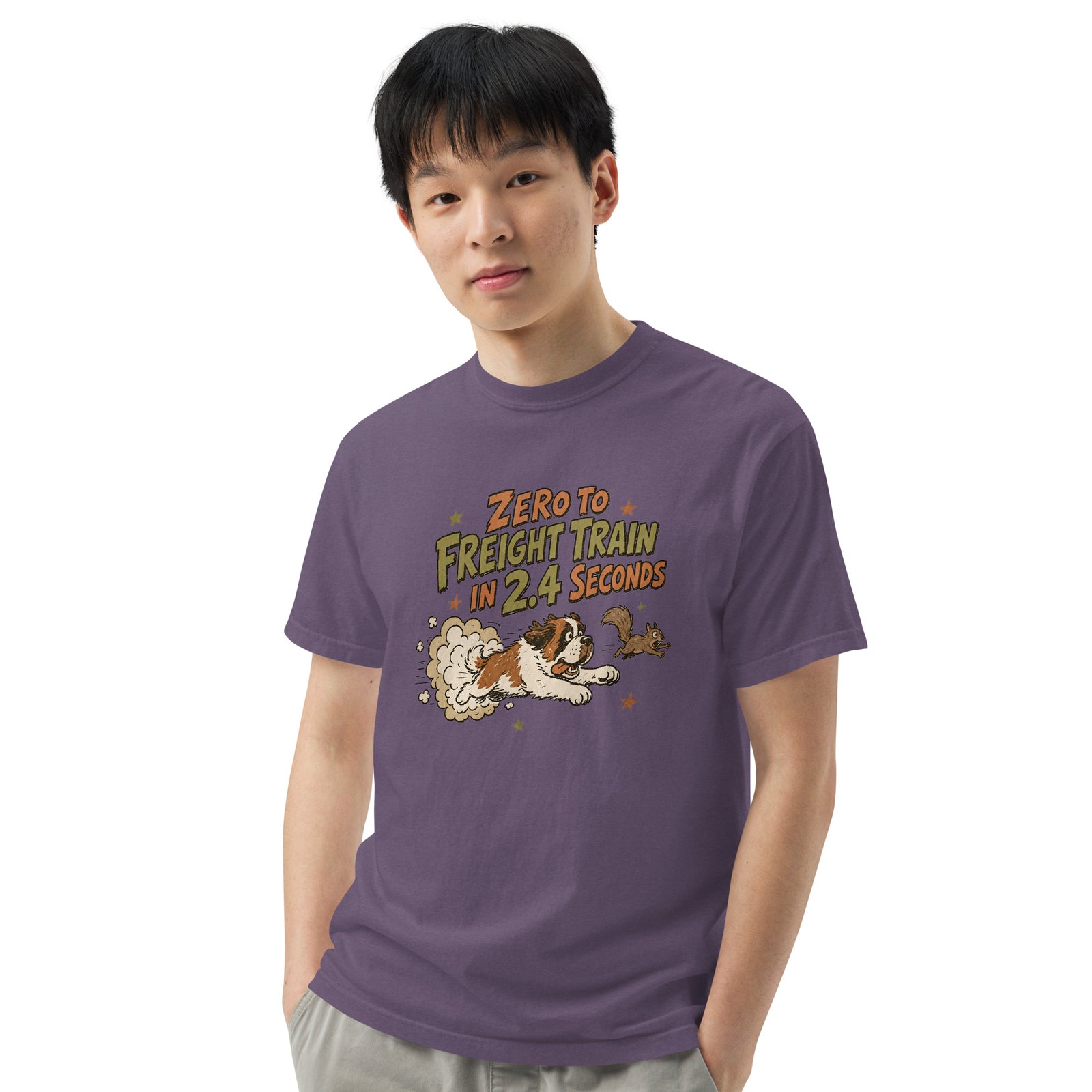 Grape purple Comfort Colors t-shirt with a retro earth tone cartoon of a funny Saint Bernard chasing a squirrel and Zero to Freight Train in 2.4 Seconds lettering.