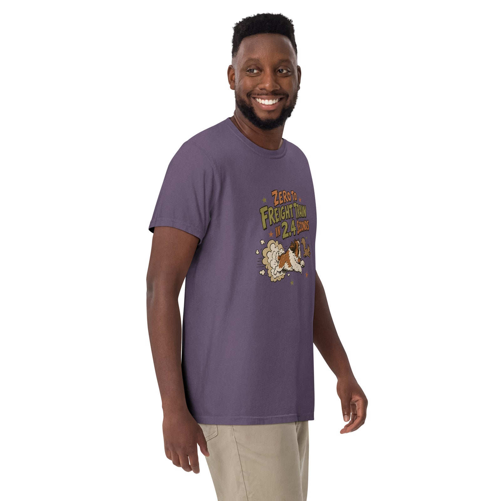 Grape purple Comfort Colors t-shirt with a retro earth tone cartoon of a funny Saint Bernard chasing a squirrel and Zero to Freight Train in 2.4 Seconds lettering.