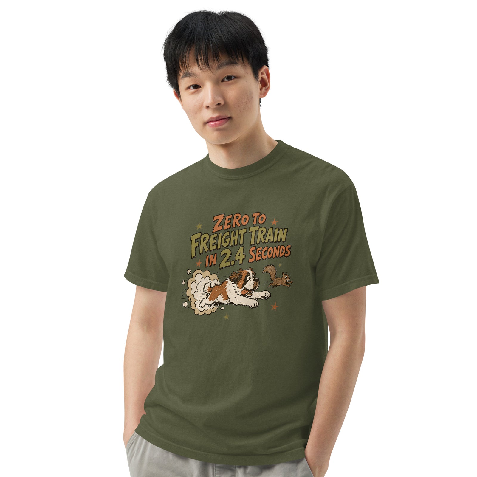 Hemp green Comfort Colors t-shirt with a retro earth tone cartoon of a funny Saint Bernard chasing a squirrel and Zero to Freight Train in 2.4 Seconds lettering.