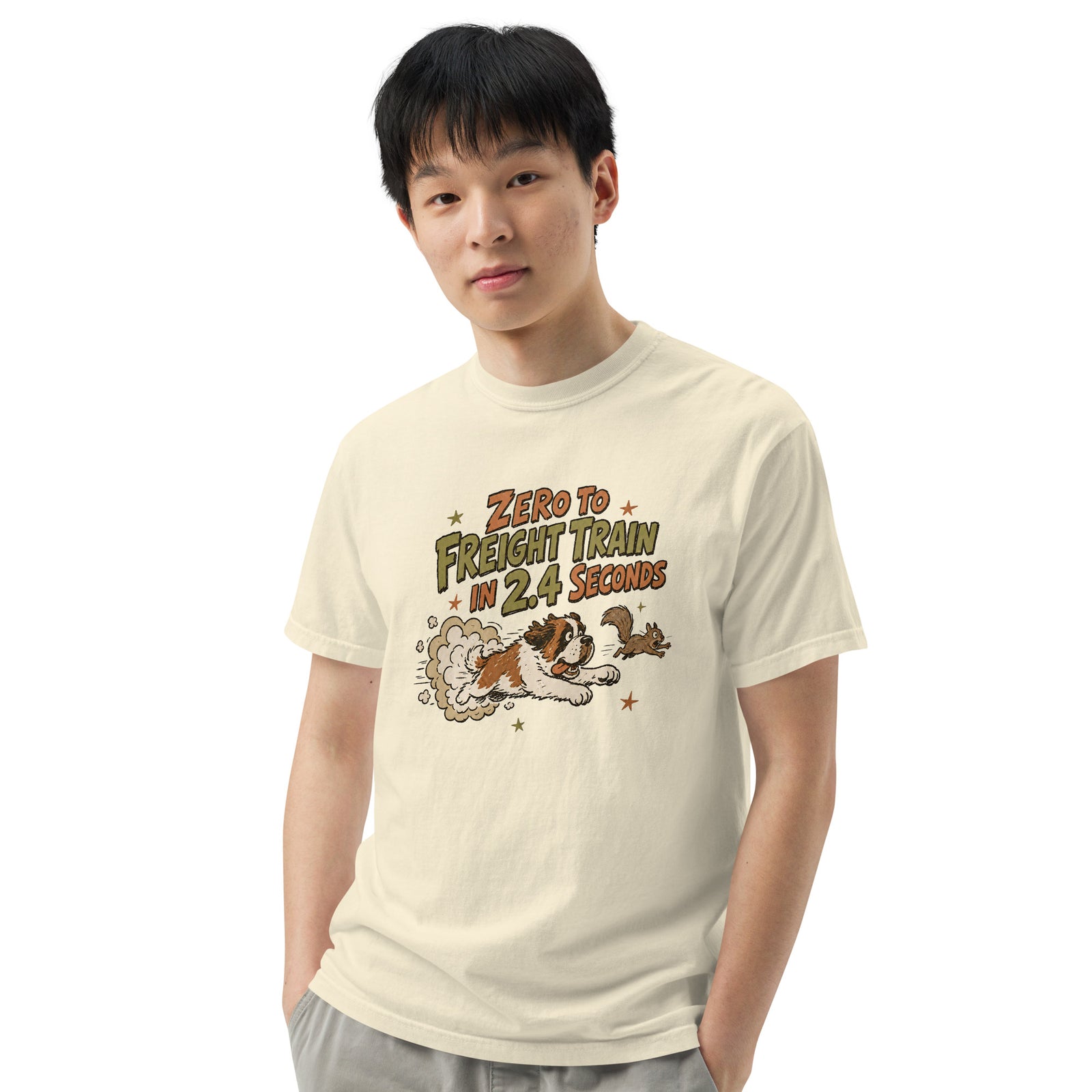 Ivory Comfort Colors t-shirt with a retro earth tone cartoon of a funny Saint Bernard chasing a squirrel and Zero to Freight Train in 2.4 Seconds lettering.