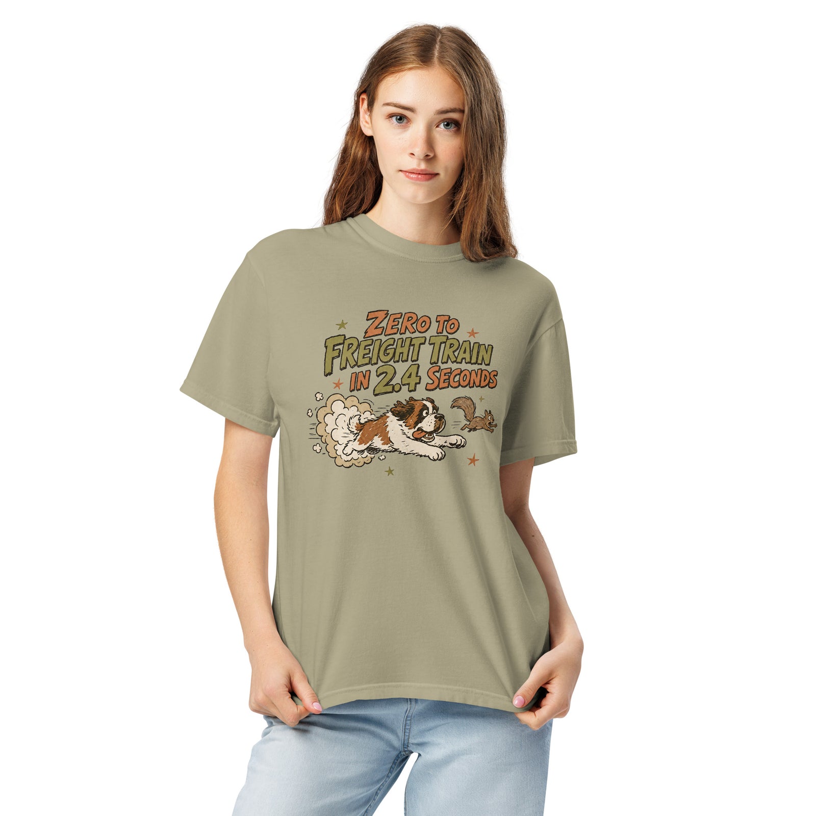 Khaki Comfort Colors t-shirt with a retro earth tone cartoon of a funny Saint Bernard chasing a squirrel and Zero to Freight Train in 2.4 Seconds lettering.