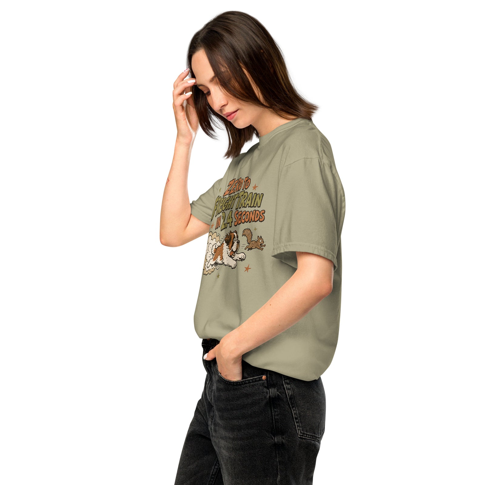 Khaki Comfort Colors t-shirt with a retro earth tone cartoon of a funny Saint Bernard chasing a squirrel and Zero to Freight Train in 2.4 Seconds lettering.