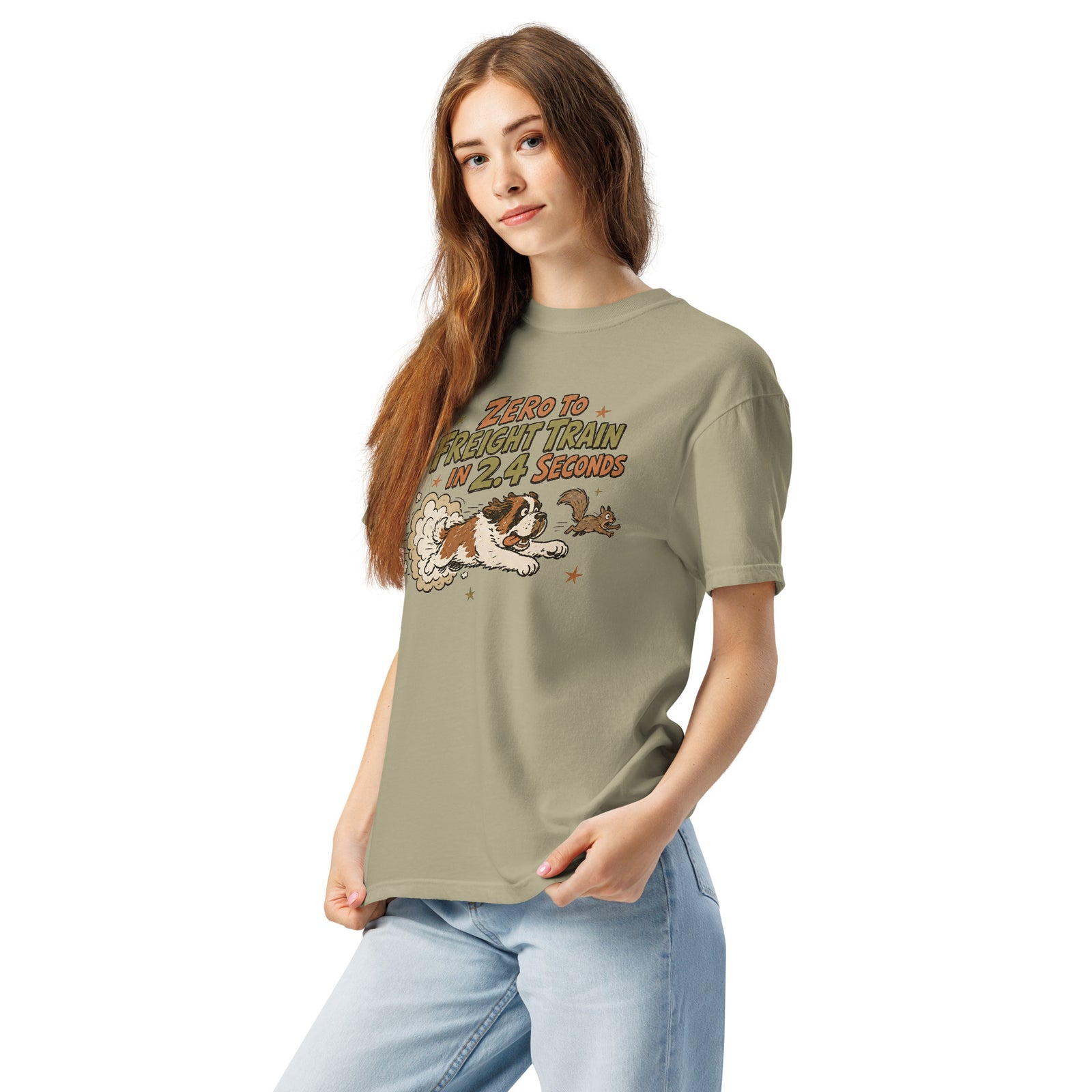 Khaki Comfort Colors t-shirt with a retro earth tone cartoon of a funny Saint Bernard chasing a squirrel and Zero to Freight Train in 2.4 Seconds lettering.
