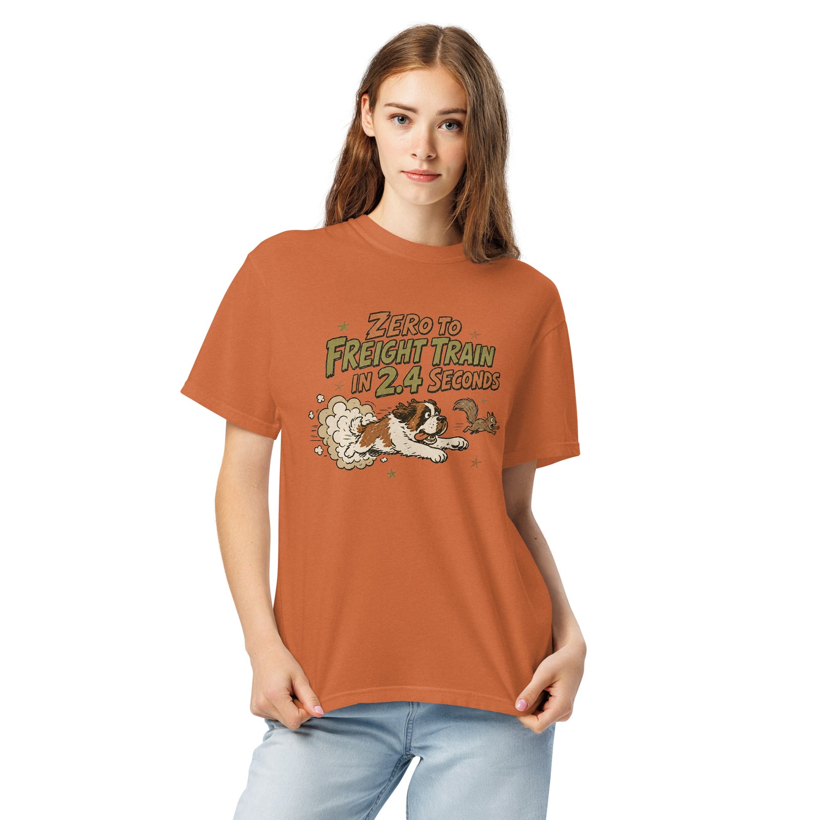 Orange yam Comfort Colors t-shirt with a retro earth tone cartoon of a funny Saint Bernard chasing a squirrel and Zero to Freight Train in 2.4 Seconds lettering.