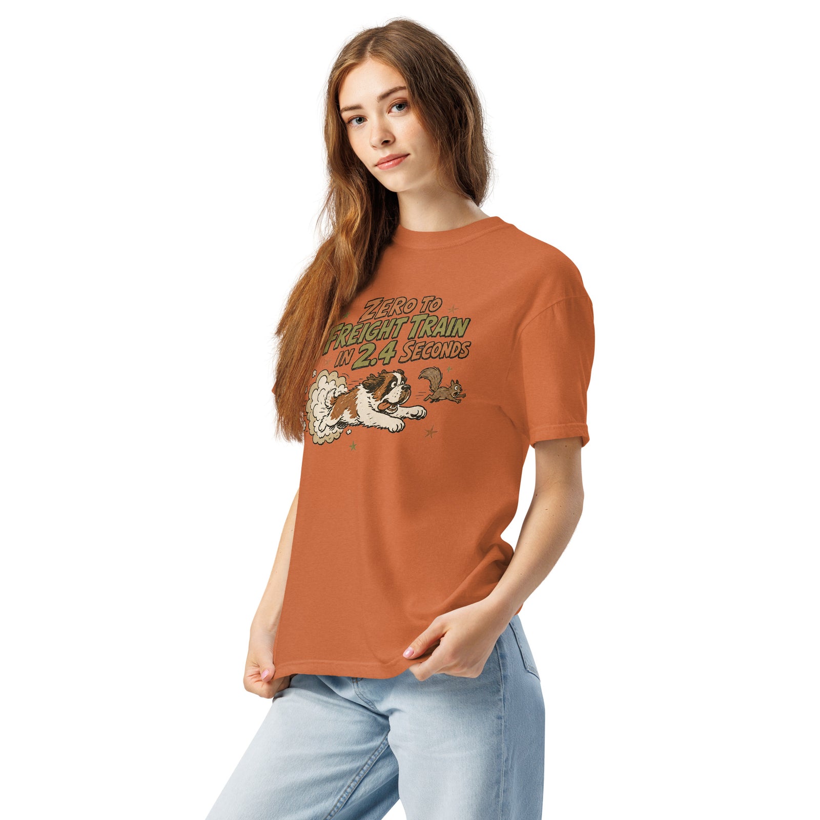 Orange yam Comfort Colors t-shirt with a retro earth tone cartoon of a funny Saint Bernard chasing a squirrel and Zero to Freight Train in 2.4 Seconds lettering.