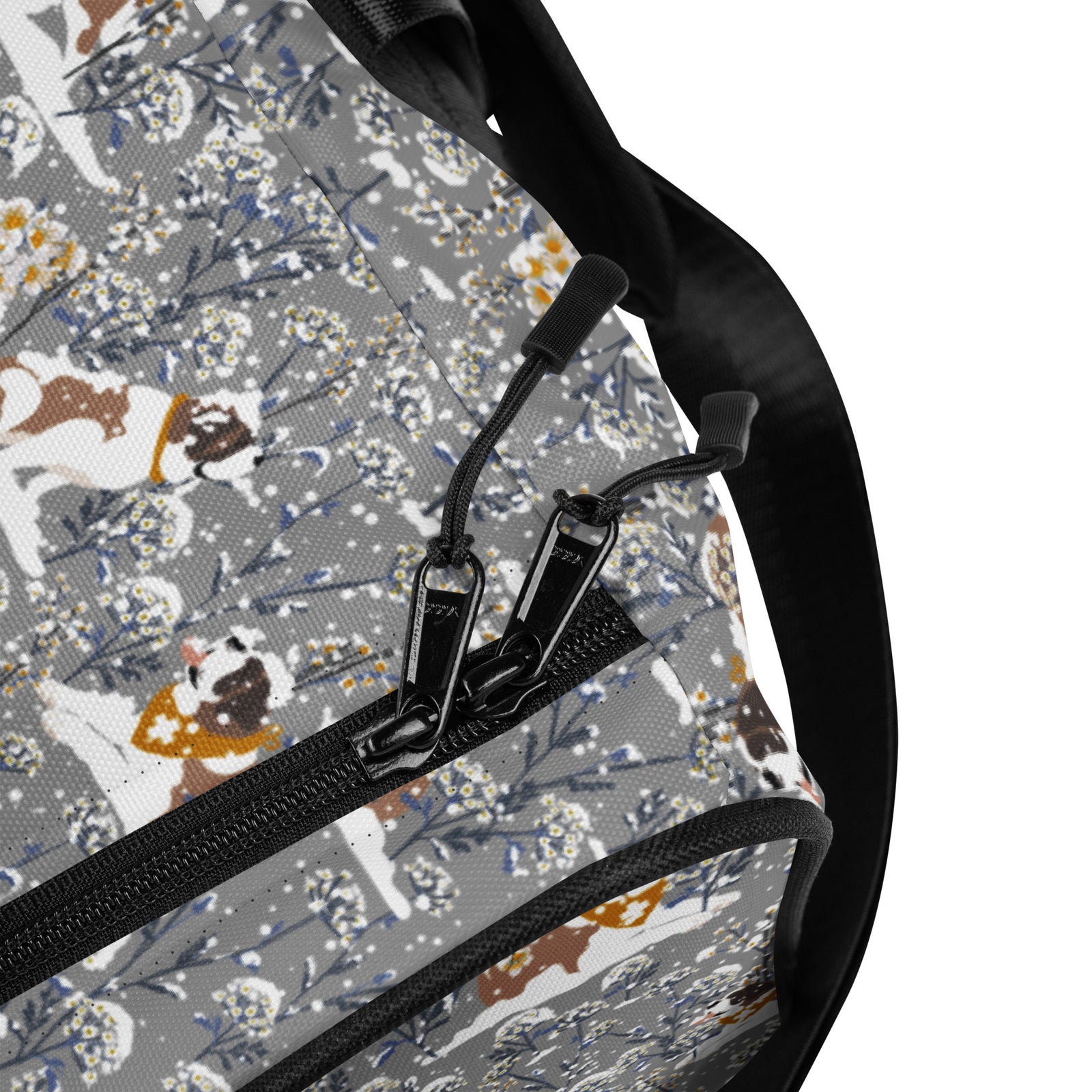 Snowflowers Saint Bernard floral duffle bag in soft gray, blue, white, and winter floral tones with padded black shoulder strap, handles, zip compartment, and mesh side pocket.