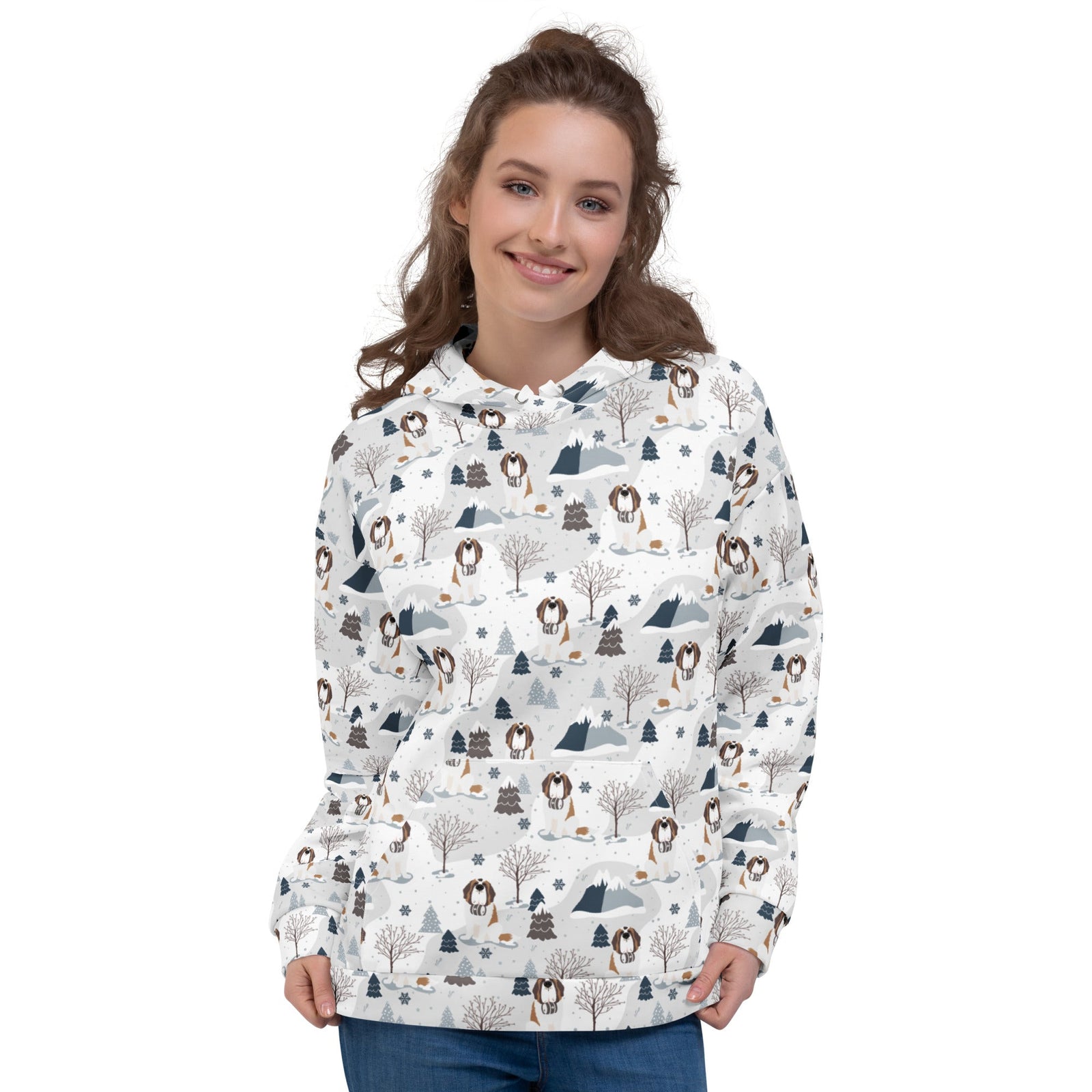 Unisex hoodie with Saint Bernard mountain pattern featuring Norman with snowy peaks, pines and trees on a white background — cozy fleece-lined dog lover hoodie by Lucy + and Norman.