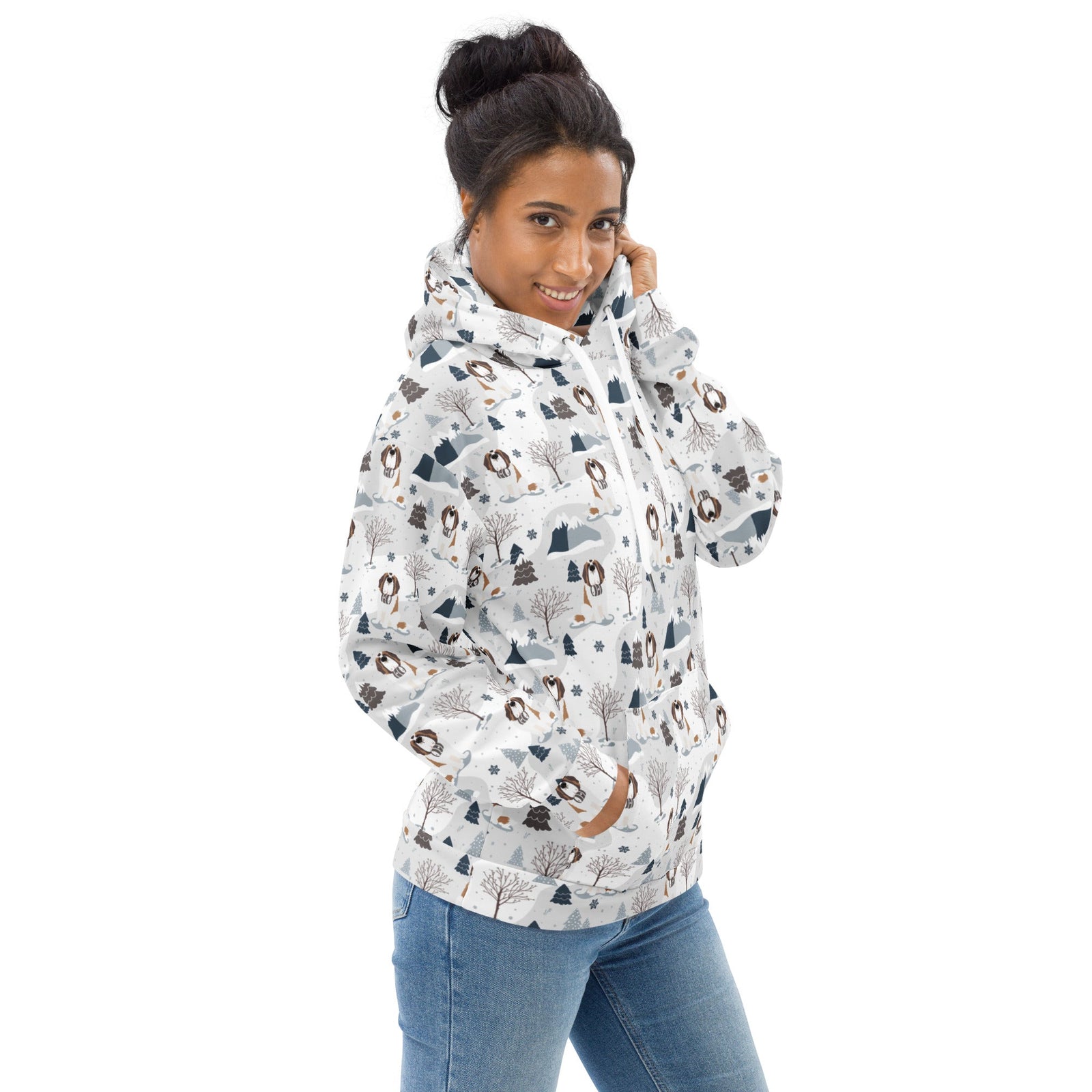 Unisex hoodie with Saint Bernard mountain pattern featuring Norman with snowy peaks, pines and trees on a white background — cozy fleece-lined dog lover hoodie by Lucy + and Norman.