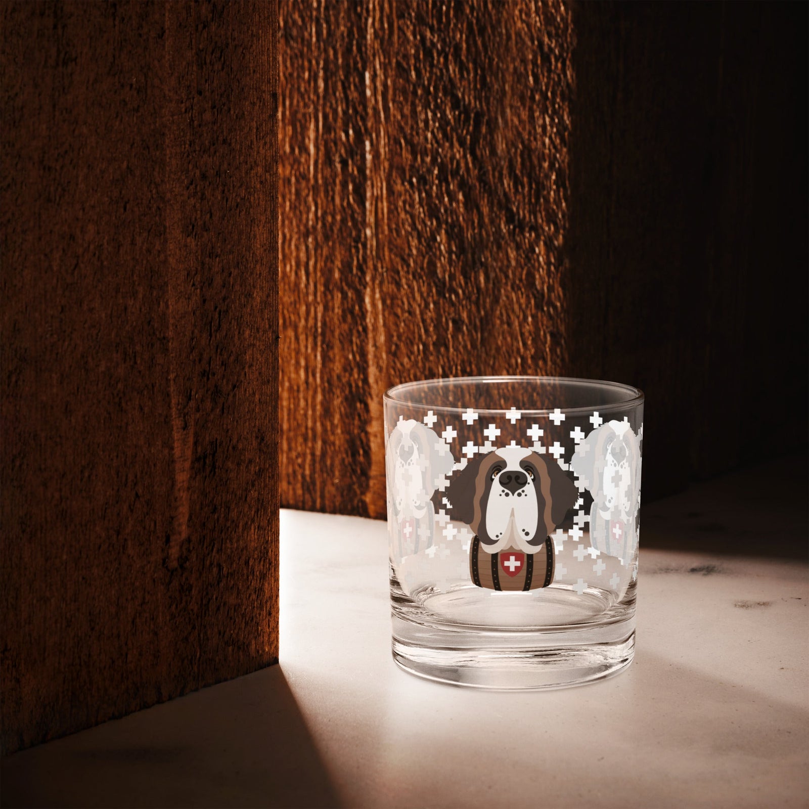 10.5 once rock glass drinkware with a modern pattern of Swiss inspired white crosses and a cute large Saint Bernard dog head with a barrel by Lucy and Norman