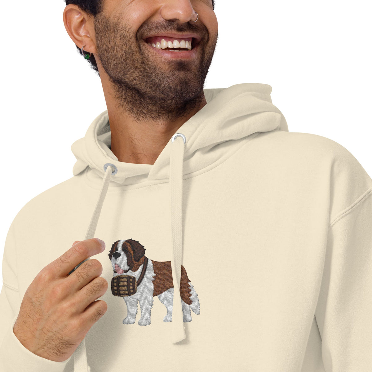 Premium hoodie embroidered with a detailed Saint Bernard with a barrel around its neck by Lucy and Norman.