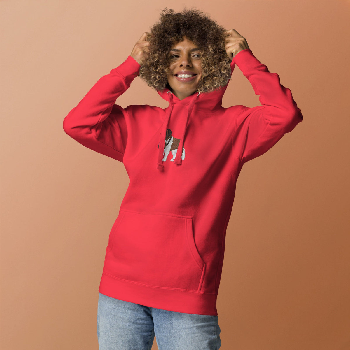 Premium hoodie embroidered with a detailed Saint Bernard with a barrel around its neck by Lucy and Norman.