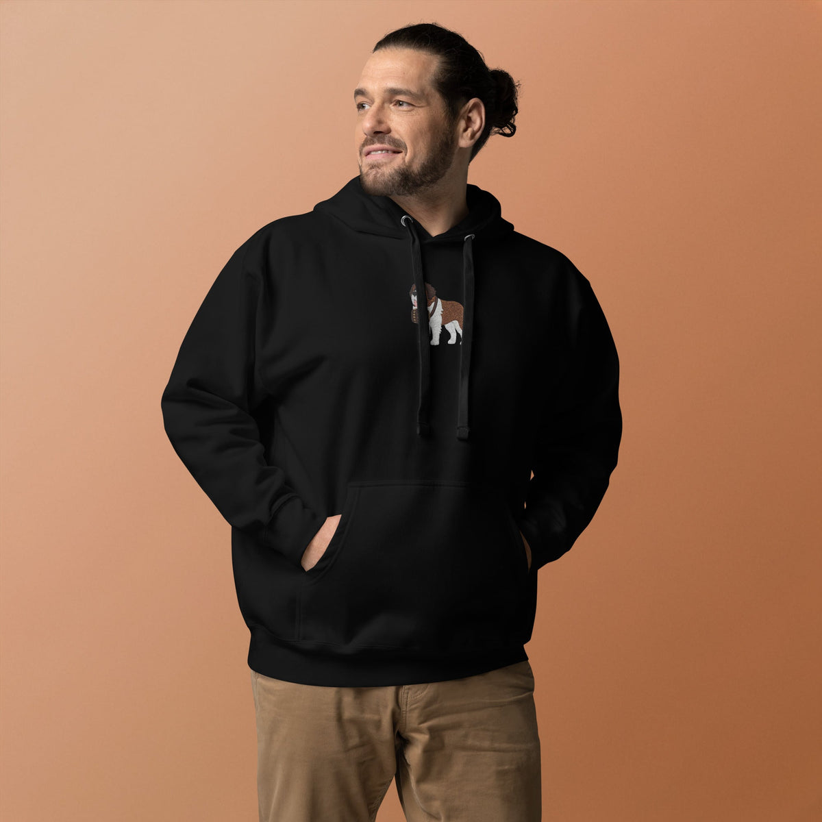 Premium hoodie embroidered with a detailed Saint Bernard with a barrel around its neck by Lucy and Norman.