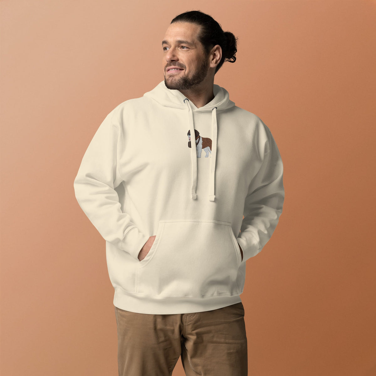 Premium hoodie embroidered with a detailed Saint Bernard with a barrel around its neck by Lucy and Norman.