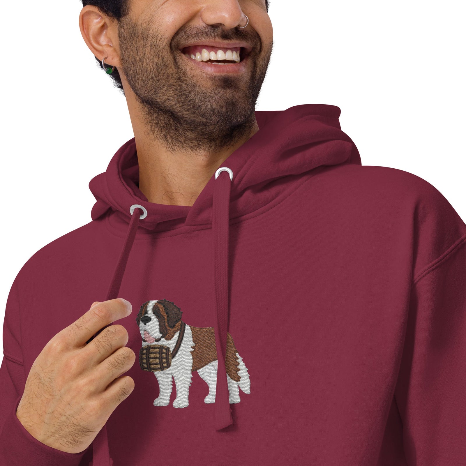 Premium hoodie embroidered with a detailed Saint Bernard with a barrel around its neck by Lucy and Norman.
